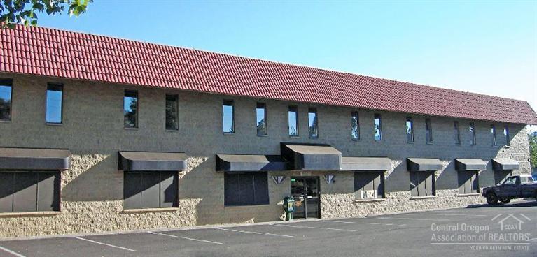 The Spectrum Executive Suites building is a professional office building. The building is an all Concrete Molded Unit (CMU) block structure with a new roof and HVAC systems. The property includes 30 parking stalls located on both the north and south sides of the premises. The two story building totals 14,900 rentable square feet with 26 tenants currently occupying 28 of the 31 suites. The property includes a shared conference room, multiple office suites, and sits on a 0.48 acre (20,908 SF) taxlot.