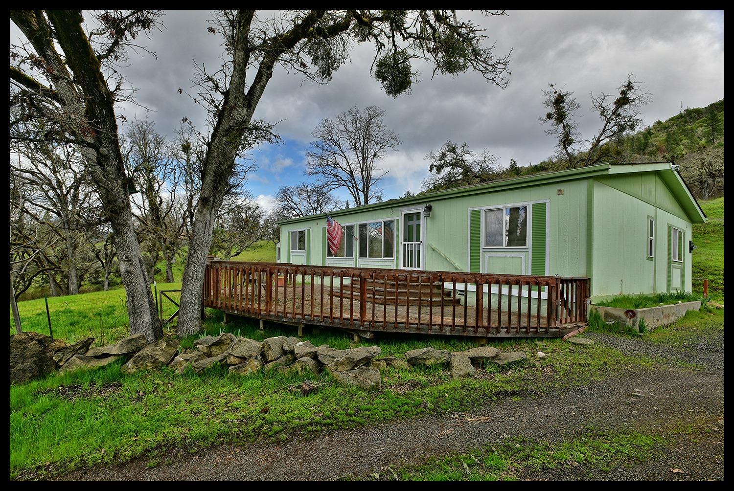 This hard to find property will not last long! Situated on over a half acre, this home offers 3 bedrooms, 2 bathrooms and has a detached oversize 2 car garage/shop and a large storage shed. There are lovely views from the home and it sits back from the road just enough to offer a bit of privacy.