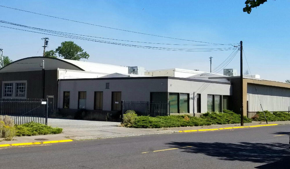 Incredible opportunity to own a landmark building in the heart of the downtown Klamath Falls.  Huge warehouse, office space and extra storage building!  All gated and in a highly visible location across from the Klamath County Museum.  Major improvements in the last few years include roof, and heating system.   There is a loading doc and access to the warehouse from two sides.  Truly a multipurpose structure for almost any business... with small income from billboard that leases space on the property.  Versatile storage on site as well as greenspace.