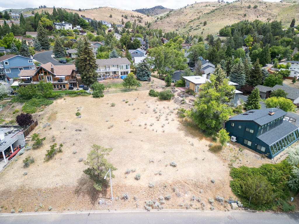 Build your dream home in one of the area's most sought-after neighborhoods - Nob Hill! Public utilities—water, sewer, and power—are readily available at the property, making development straightforward. Perched in a great location, you'll enjoy sweeping views of the city, Mt. Shasta, Lake Ewuana, and the surrounding landscape. Conveniently located close to Oregon Tech, Sky Lakes Medical, Roosevelt Elementary School, and all Downtown Klamath amenities don't miss out on this great opportunity! The lot next door is also for sale; purchase both for added acreage!