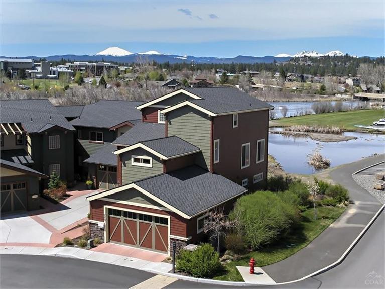 Located in the heart of the Old Mill District along the banks of the Deschutes River in sunny Bend, Oregon. Walk or ride your bike to everything! Enjoy the lifestyle that living in the Old Mill District offers. 3 master suites, private elevator and great Cascade Mtn. Views along with pond & river views. Stand alone unit.