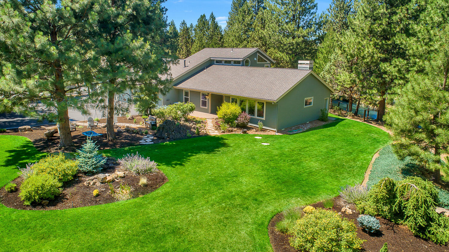 Beautiful, updated home nestled in a park like setting at the end of cul-de-sac! Situated on a spectacular 3/4 acre backing to a seasonal irrigation canal, this home is a rare find! This unequaled setting offers privacy, serenity, and room to roam while the pristine condition of this home help significantly differentiate this home from the competition. Over $250,000 in upgrades, some of which include all new Milgard windows, window treatments, Hickory wood flooring, tile & carpeting. The kitchen boasts Quartz countertops, Cherry wood cabinets, updated lighting, breakfast bar, stainless steel appliances, Viking Professional cook-top, double oven and wet bar. A 418 sq. ft. Bonus Room above the 4 CAR garage offers the new owner an opportunity for an ADU/micro apartment with private exterior access available (would require a staircase). The beautiful landscaped backyard sits on the edge of an irrigation canal, separating this home from the 12th fairway of the Old Back 9 golf course!