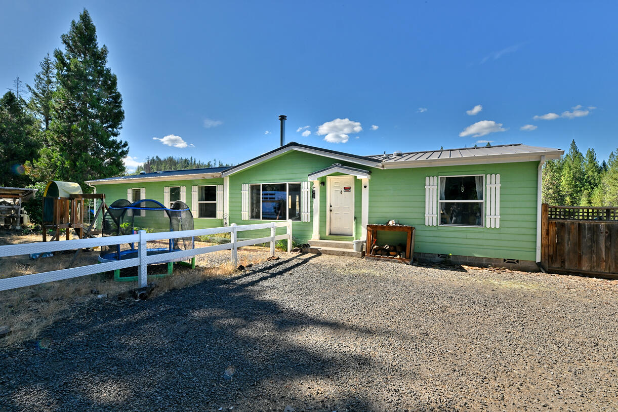 Ranch life at its finest! 4Br, 2Ba home, Large Shop and LOTS of Ammenities make this 19+Ac property an ideal place to call Home! Solar Powered with Newer Metal Roof is a bonus for off grid living and will be paid off by the seller at close of escrow. The property is connected to Public Water which comes in handy for watering your animals and gardens. Cat Tail Creek is year round and runs through the property.  Property Features: Mature Fruit Trees, 12x12 Shed, 4 Chicken Coops, Hog Pen, Duck Pond, Garden with Raised Beds, 1 Pasture Fenced with Secondary Fencing T-Posted, 2in. PVC Piping for Irrigation (approx 1000yd), Gated side property, Outdoor Propane Fireplace, Sheep Pen, 5 Waters for Multi Irrigation with 220 Outlets attached to each area, and Rabbit Hutches.  Bring your toys and ride off to the adjacent BLM! The wildlife is plentiful with Turkey, Deer, Quail and Elk! A MUST see to appreciate! Prequalified buyers ONLY, NOT a driveby. Call today to set up a private tour!