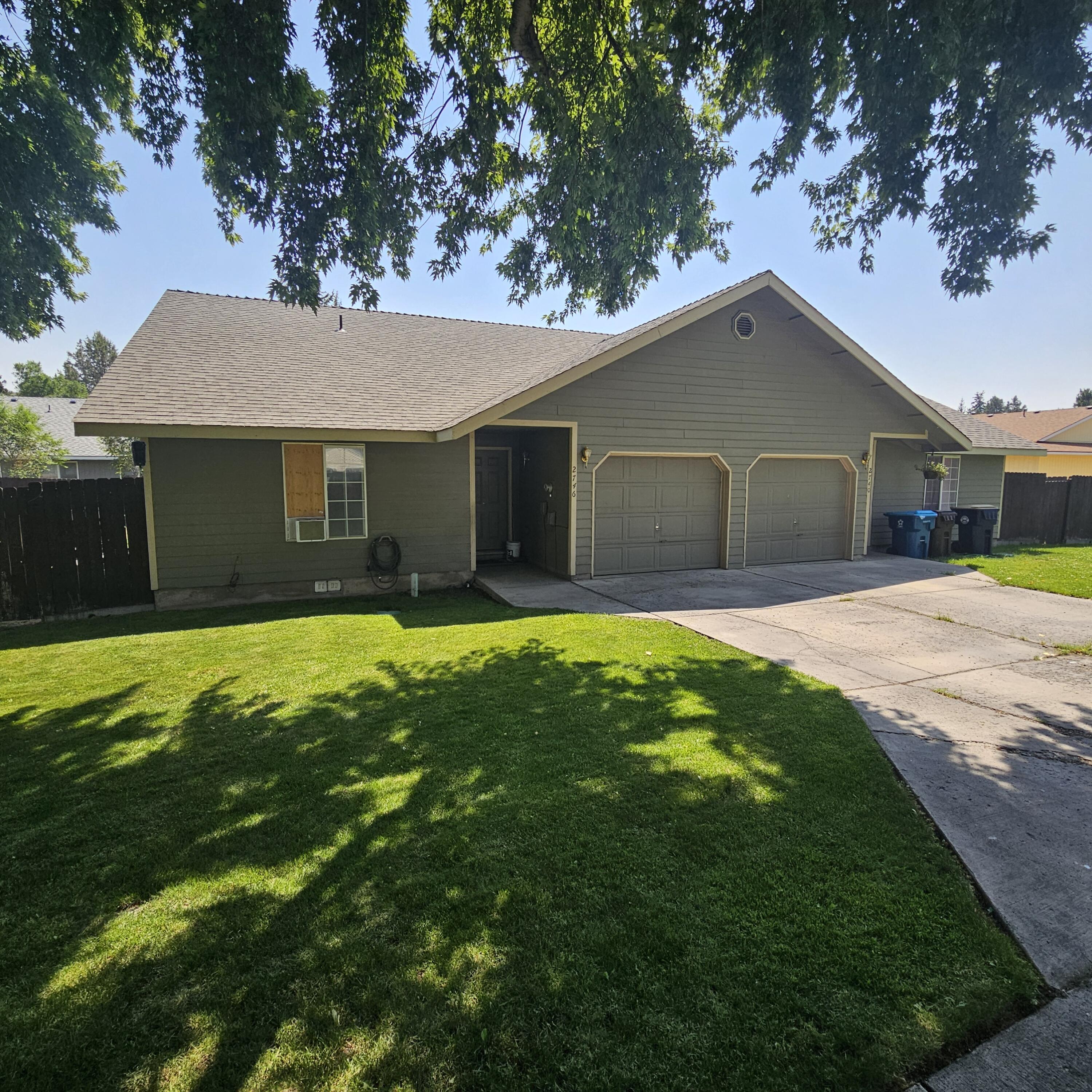 Opportunity is knocking with this single level townhome in Southwest Redmond. Offering 3 bedrooms 2 baths and an open concept plan. There is a mini split ductless heatpump for central cooling and heating, as well as wall heat for individual rooms. The side and rear yard is completely fenced with a dedicated dog run and small storage shed.   Located just minutes from Umatilla Sports Complex, Roberts Field Airport, the Deschutes County Fairgrounds and access to HWY 97. Let this home be our starting and ending point for all things Central Oregon.