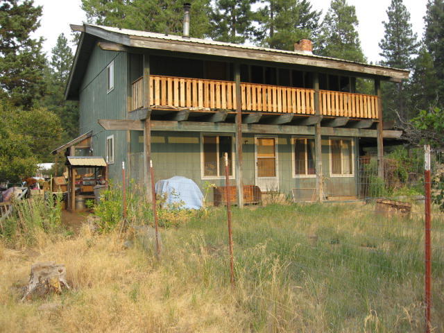 Beautiful wooded 4.61 acres nestled in Keno Whispering Pines. Property is fully fenced and cross fenced with a large barn and several nice outbuildings. Home is unique offering open beam ceiling and a nice balcony off of massive master bedroom. Perfect property for large and small animal owners. The acreage is level and backs up to BLM land for access to trail riding.