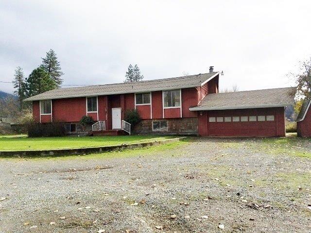 RELISTED! This home requires a K rehab loan! This home is really much larger with the unfinished basement. With beautiful views of TWO year round creeks, Evans Creek and Pleasant Creek, from your deck. All rooms are large with infinite possibilities for the basement...rooms for crafts, office, workout? Whatever your heart desires. With over 2 acres of property, the opportunities are endless.