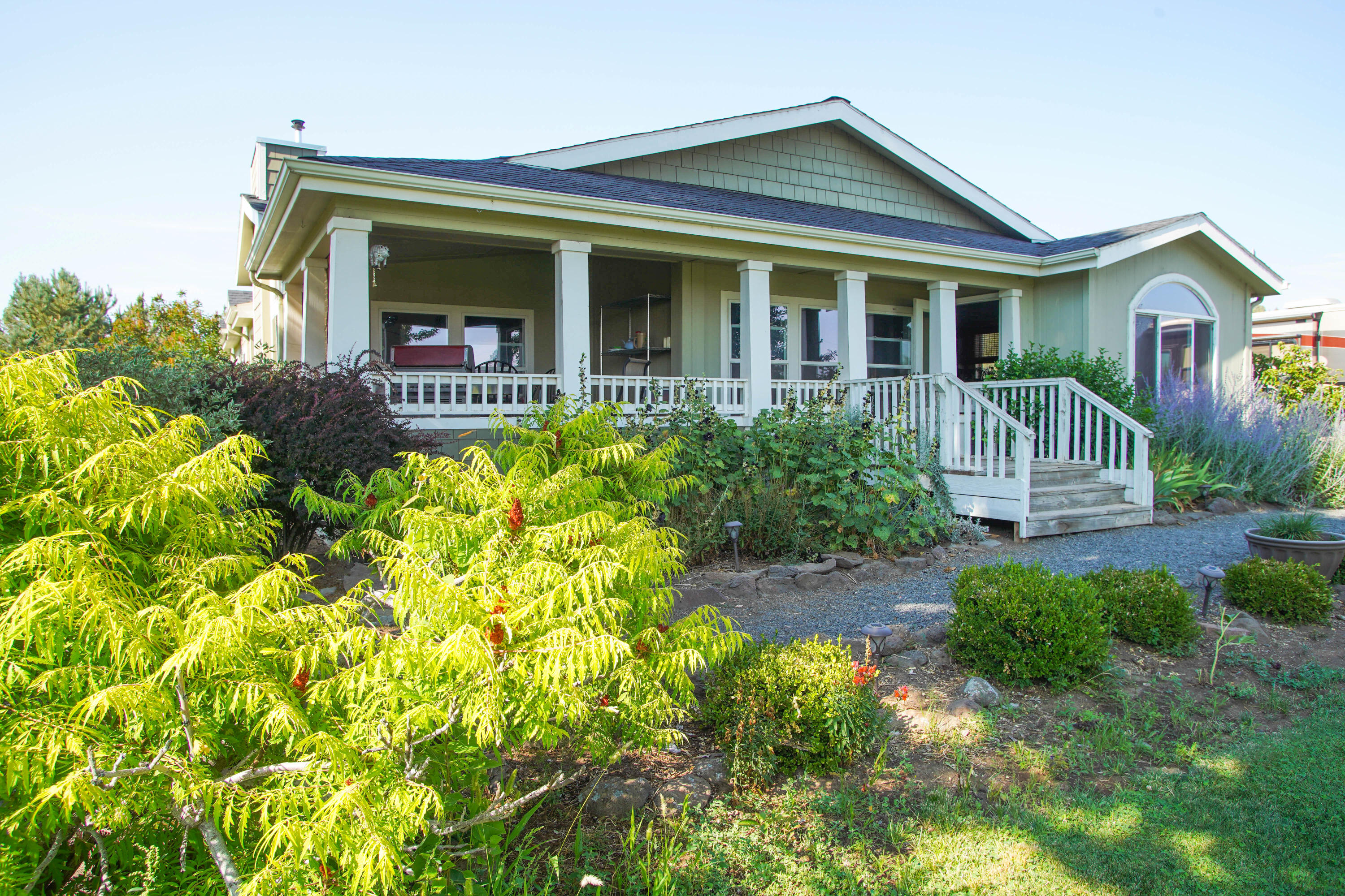 The Rock Bottom Ranch is up for sale. This property is a unique setting as it used to be a working koi farm and nursery. The 3 bedroom 2 bath original farm house has been tastefully updated and there is a second home on the property currently being used as a VRBO with an ave of $20k plus income per year. It is a very good quality Palm Harbor manufactured home with 4 bedrooms and 3 baths along with five 50 amp services for a group of RVer's to come enjoy a weekend on the ranch. Take a peaceful walk through the small vineyard on your way out to the koi pond. Other amenities include  new solar panels that produce 22.8KW DC, a 42x96 clear span structure to store equipment, a second breeding pond for koi, barn and many other outbuildings. All this sits on 5 lots with a total of 204.71 acres with a current irrigation well serving 20.3 acres of water rights. The property does have a second well that is an  artisan well not currently in use at this time.