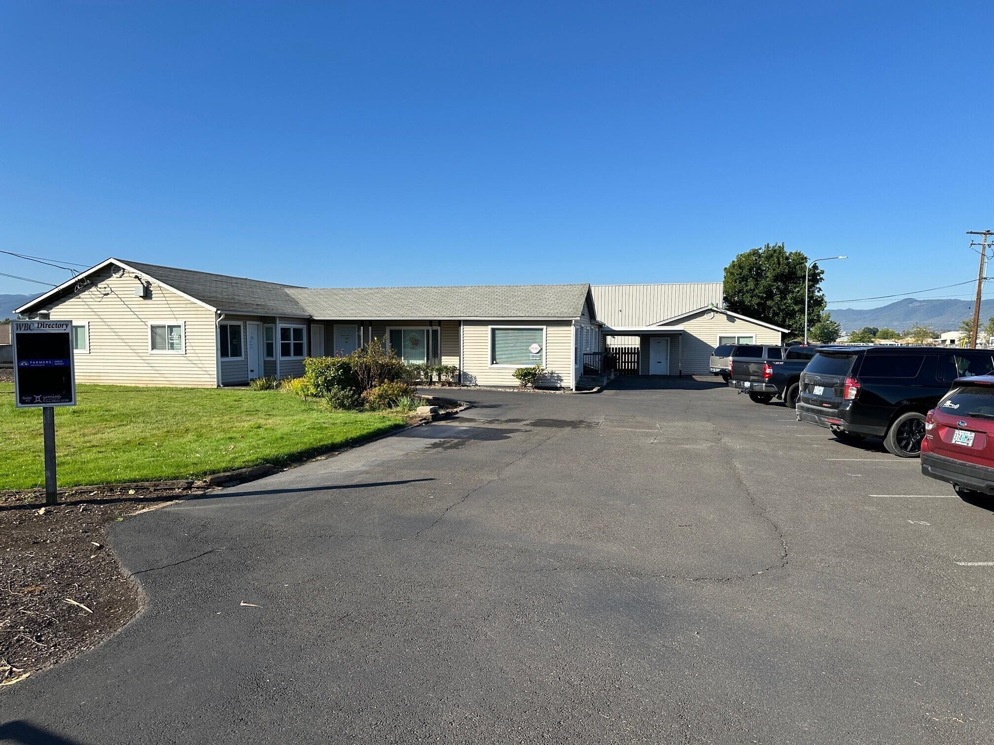 Excellent small business investment/owner-user property. Professional office with multiple separate offices, remodeled in 2005. Located centrally in Medford behind Dazey Hardware at Whittle & Sky Park. Includes 10 private offices with 3 shared and private bathrooms. Some offices were recently remodeled. Hunter fiber available. Off-street parking. Excellent for service businesses, financial or insurance. Easy walk to services and restaurants. Have your own office with other tenants paying rent, or expand as your company grows. ''Motivated Seller! Price Reduced 25% to $295,000 under current appraised value. Excellent small business investment/owner-user property. Owner user option to occupy vacant unit while earning income from remaining units. Call to arrange tour. Please do not disturb tenants. Broker is related to Seller.''