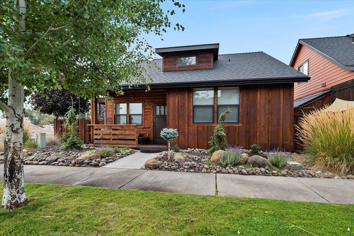 Check Out This Fantastic Craftsmen Style Home! This very well built and super clean home is located only 2 blocks away from Downtown Sisters and everything Downtown has has to offer. Inside you will experience a wonderful open farm style kitchen with Quartz counter tops, Farm style sink, soft close cabinets and drawers, under cabinet lighting, eating bar, pantry and a custom wood wainscot wall in the dinning area. The spacious living area ties in with the kitchen and dinning area with Vinyl Plank flooring, ductless heating and cooling with custom wood wrapped doors and windows throughout the home. The primary bedroom is on the main level with a custom built farm sliding door to access the living area and joins the the full bathroom with quartz counter top, tiled shower with a full height glass door. Access to the loft area is located in the Primary Bedroom and has a built in bed with ductless heat and cooling.  Outside you have a covered parking area great for a small RV's and boats.