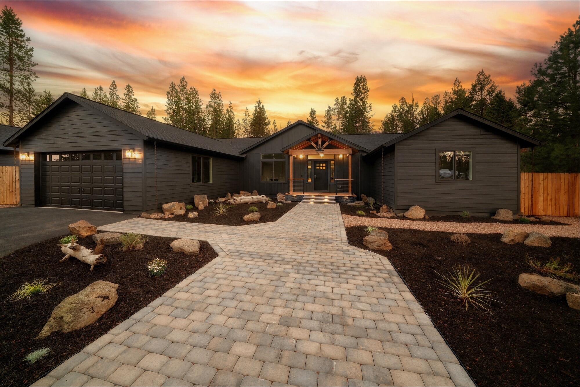Welcome to this brand new custom-built single-level home offering 2,188 sqft of thoughtfully designed living space on a peaceful and private 1.32-acre lot. This 3 bed 2 ba home features vaulted ceilings, an open-concept layout, & an abundance of natural light throughout. The split floor plan provides ideal privacy, w/ the spacious primary suite on one end, two guest bedrooms on the other, & a dedicated office right off the entry—perfect for working from home or creating a quiet retreat. Step outside to a large, covered back deck overlooking a fully fenced backyard, perfect for pets, play, & privacy. A finished 2-car garage is paired with an 800 sqft detached shop—ideal for hobbies, storage, or extra workspace. From the modern layout to the quality finishes, this home is the perfect combination of style, comfort, and functionality—all on one level. Don't miss this rare opportunity to own a brand new, move-in-ready home with room to roam and space to thrive!