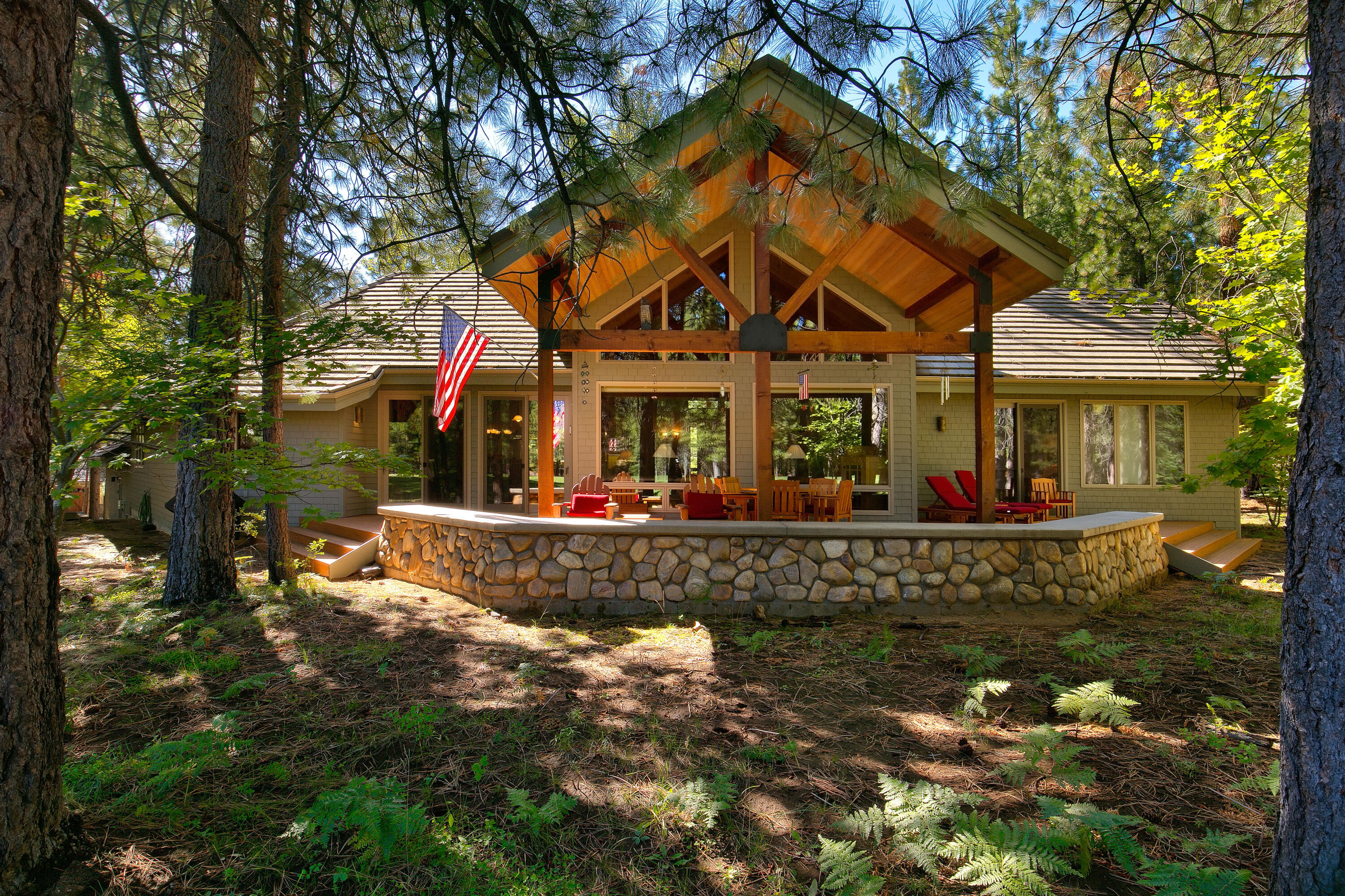 One of Black Butte Ranch's finest homes. Situated on the beautiful 12th fairway of the Glaze Meadow Golf Course, this extraordinary property on 1.5 acres features single floor living with views from every window! GM 299 features a chef's kitchen with a double oven, huge island, wet bar and lots of room for entertaining both your friends and family. Enjoy mornings and nights in the great room by starting a fire in the floor to ceiling river rock wood burning fireplace or on the covered deck with synthetic decking taking in the golf course view. The primary bedroom featuring vaulted ceilings and a custom built-in desk is conveniently located on the opposite end of the home from the other three bedrooms. Two of the three guest bedrooms share a jack-and-jill bathroom, while the third guest bedroom/media room includes an en suite bathroom. Schedule a showing to see this incredible property today!