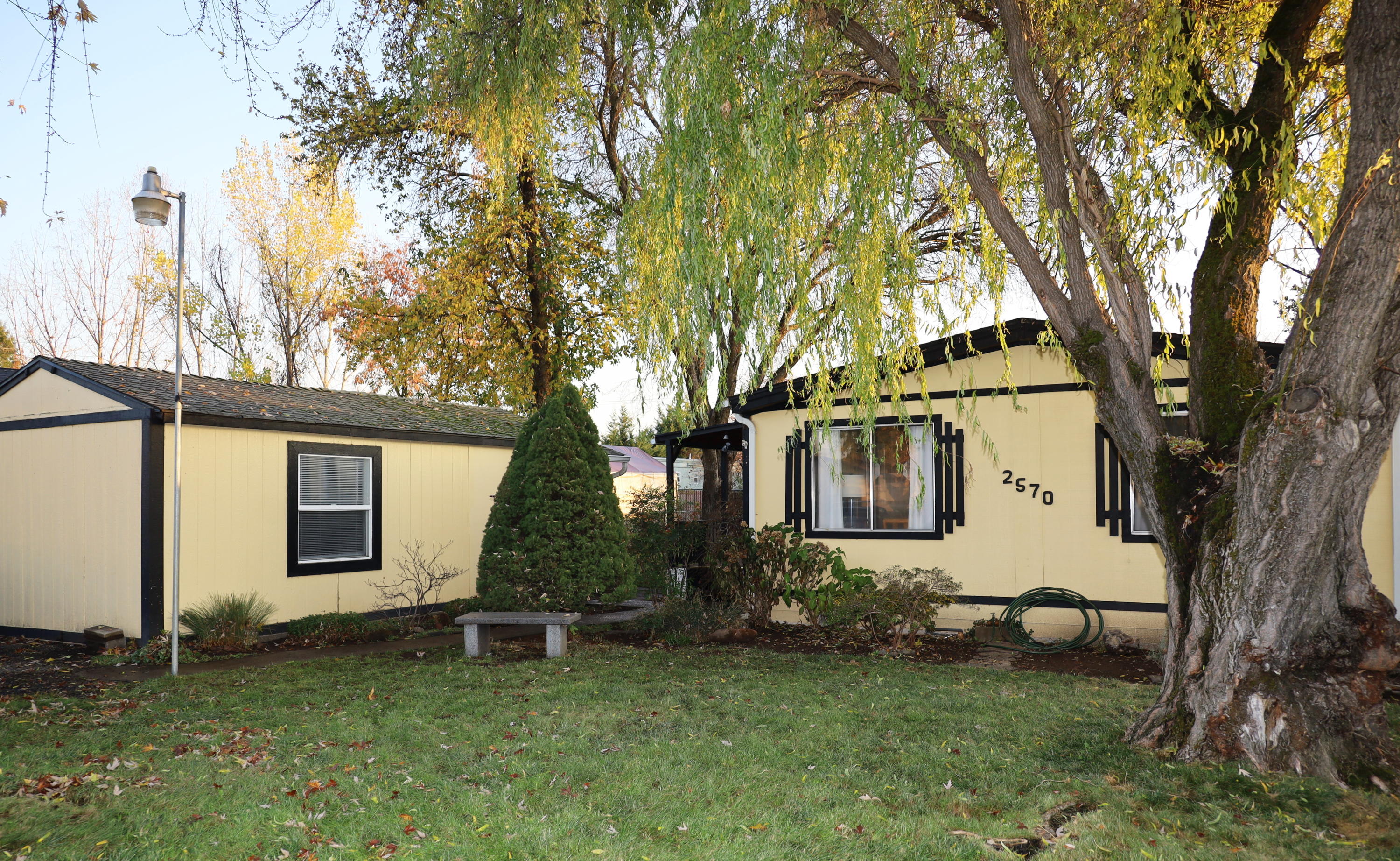 Great deal in White City good location! Don't miss out on this 2/2 with a large fenced yard! There is a bonus detached finished space for extra room, hobbies or visitors adds a extra bedroom! Mature landscaping super clean home with a very functional layout open concept. A coupe walls were removed to open up the front living area and could be put back to add a 3rd bedroom. Solid place priced good! Come take a tour today!!
