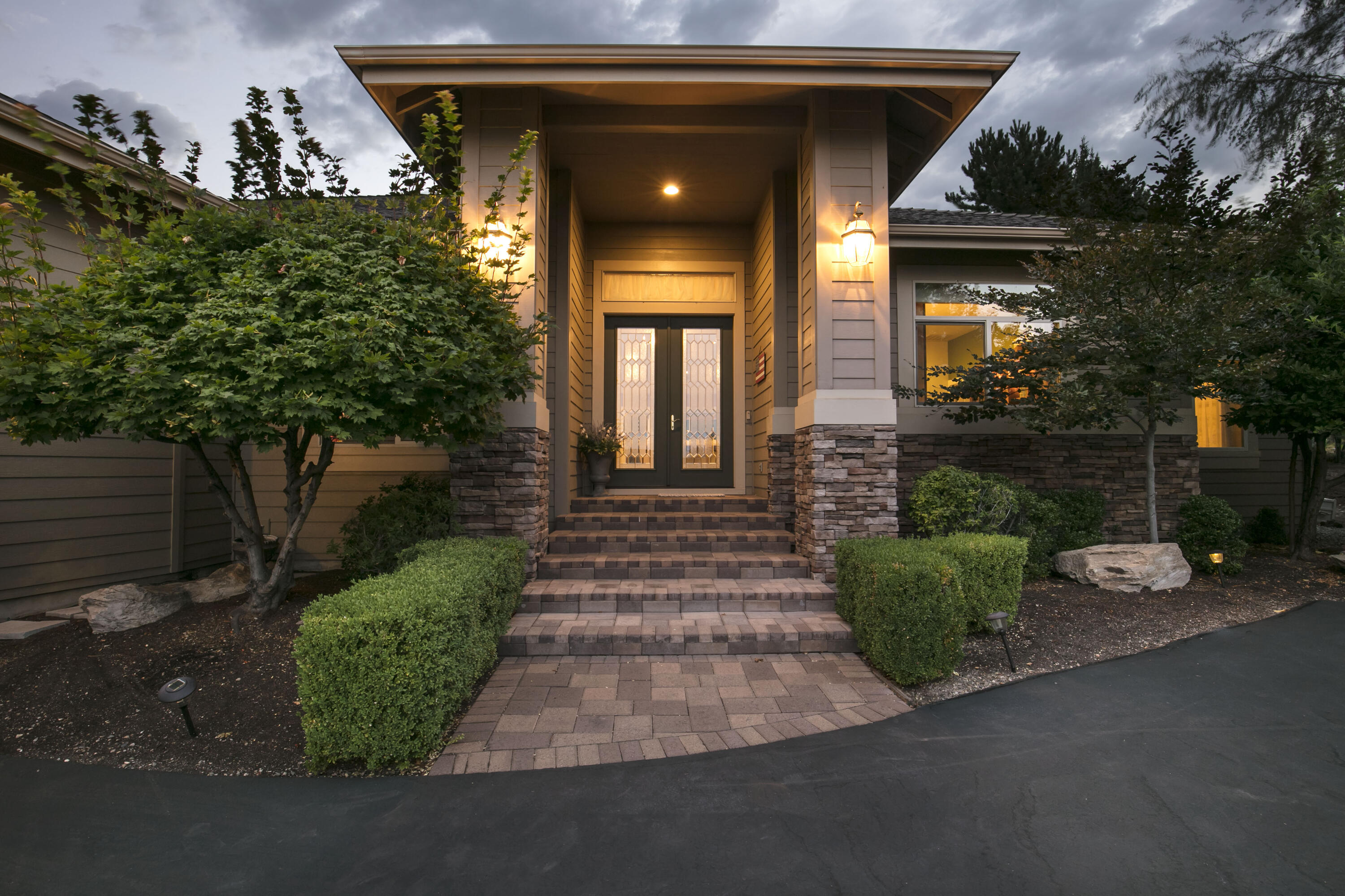 Your 5 star resort lifestyle awaits! Located on the quiet Murrelet Drive in a well established Eagle Ridge neighborhood, you'll find this gorgeous custom home! A majestic property on the 17th hole of the Challenge Course and located in the award-winning Eagle Crest resort, this single level house with 3 fireplaces and a 1100 sq ft 3 car garage is ready to call yours! An open concept living area offers plenty of breathing room and entertainment spaces, including an expansive kitchen island and dining area and a pool room complete with a stunning game table and all of the accessories included. This truly is the ideal floor plan with the primary suite and master bath, complete with a triple-sided gas fireplace, also opens to the paver patio and hot tub, while the add'l guest ensuites are located on the other wing of this spacious house and additional rooms to use as remote work areas, an office, den, study, or media room. This is a special one not to be missed!