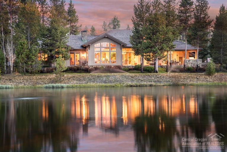 Rare opportunity to own a uniquely designed Norman built home on private, 1/2 acre lot. Backing signature 12th hole of Crosswater. Only 119 owners will call these amazing 600 acres home. NW lodge style home features open floor plan with stunning waterfront views. Four fireplaces, master on main, 3 en suite guestrooms, gourmet kitchen, formal dining, oversized pub style rec room & finished exercise room. Fish stocked lake from your backyard while watching Osprey & Bald Eagles fly by! Furnished per inventory.
