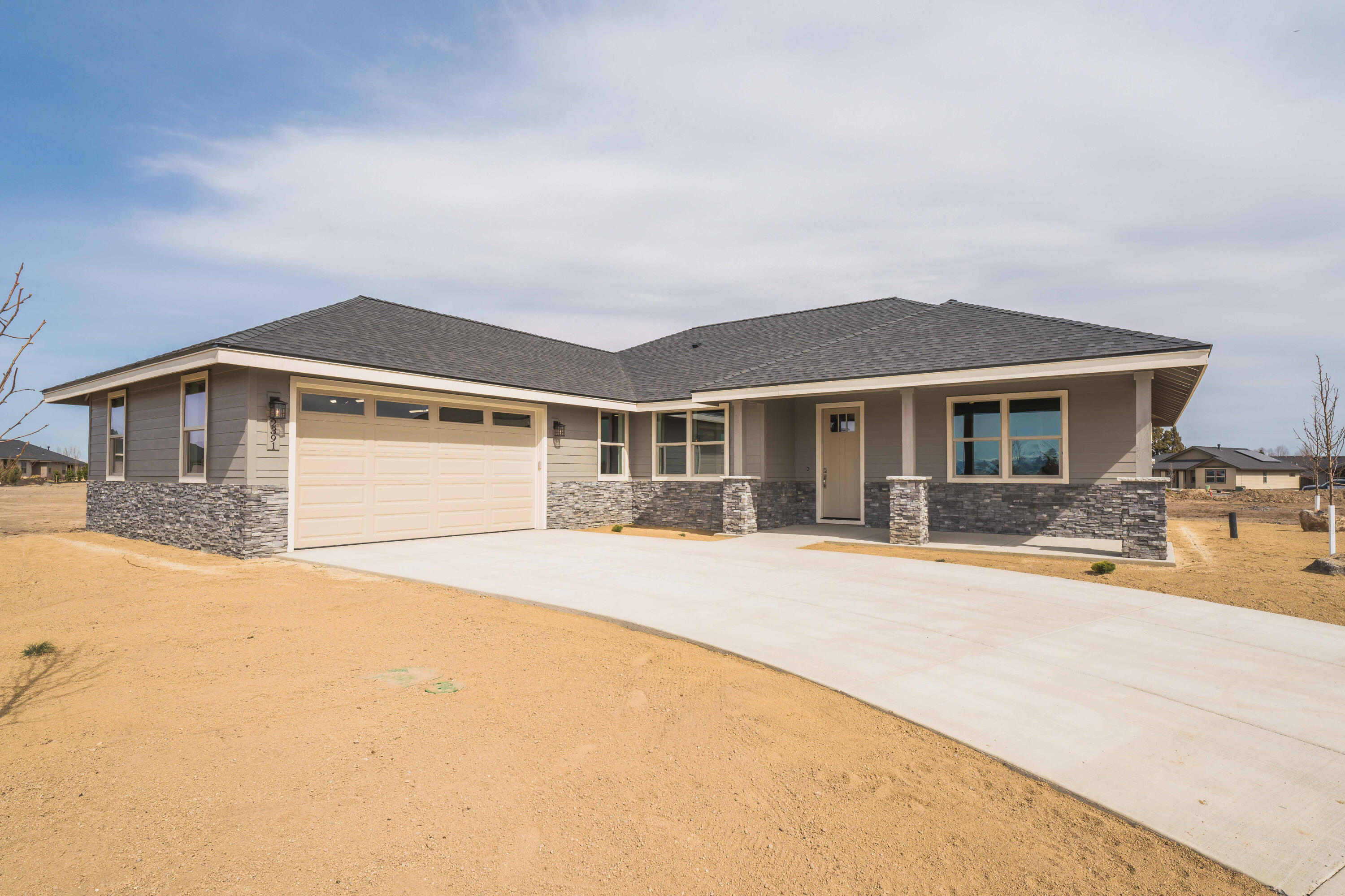 Lot 22.  Dry Canyon Village, Central Oregon's premier age-restricted 55+ gated community.  The single-level Birch floor plan features a covered front porch that leads into the spacious open great room with French doors to an office/den.  The kitchen boasts solid quartz counters with breakfast bar, undermount sink, walk-in pantry, a SS Kitchen Aid appliance package and dining area to fit the party.  A sliding glass door leads to the covered back patio perfect for entertaining.  The laundry room with utility sink is just off the double garage.  The primary suite is separate from the other two bedrooms and features a walk-in closet, mud set tile shower and double vanity bath.  The future community center will feature a yoga studio, free weights, locker room, indoor lap pool, outdoor pickle ball courts and fire pit and patio.