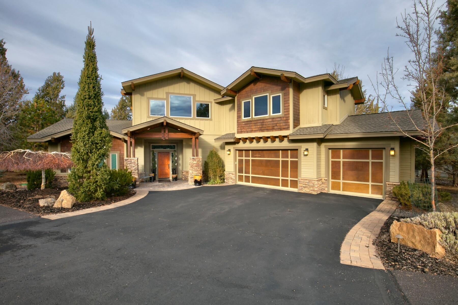 Custom built home with rare double fairway views of both the 7th and 8th holes on the Ridge Course at Eagle Crest! This 3,055 square foot home features a chef's kitchen with knotty alder cabinetry throughout, stainless steel appliances, granite countertops, hickory hardwood floors and sound system perfect for entertaining!  Kitchen open to the dining and great room with vaulted ceilings and propane fireplace. This home has three bedrooms (two primaries, one being on the first floor with fireplace), 3.5 bathrooms, a massive bonus room and oversized three car garage! Take in golf course views from both the deck and patio or starry nights from the hot tub. Check out this gem in Eagle Crest today!