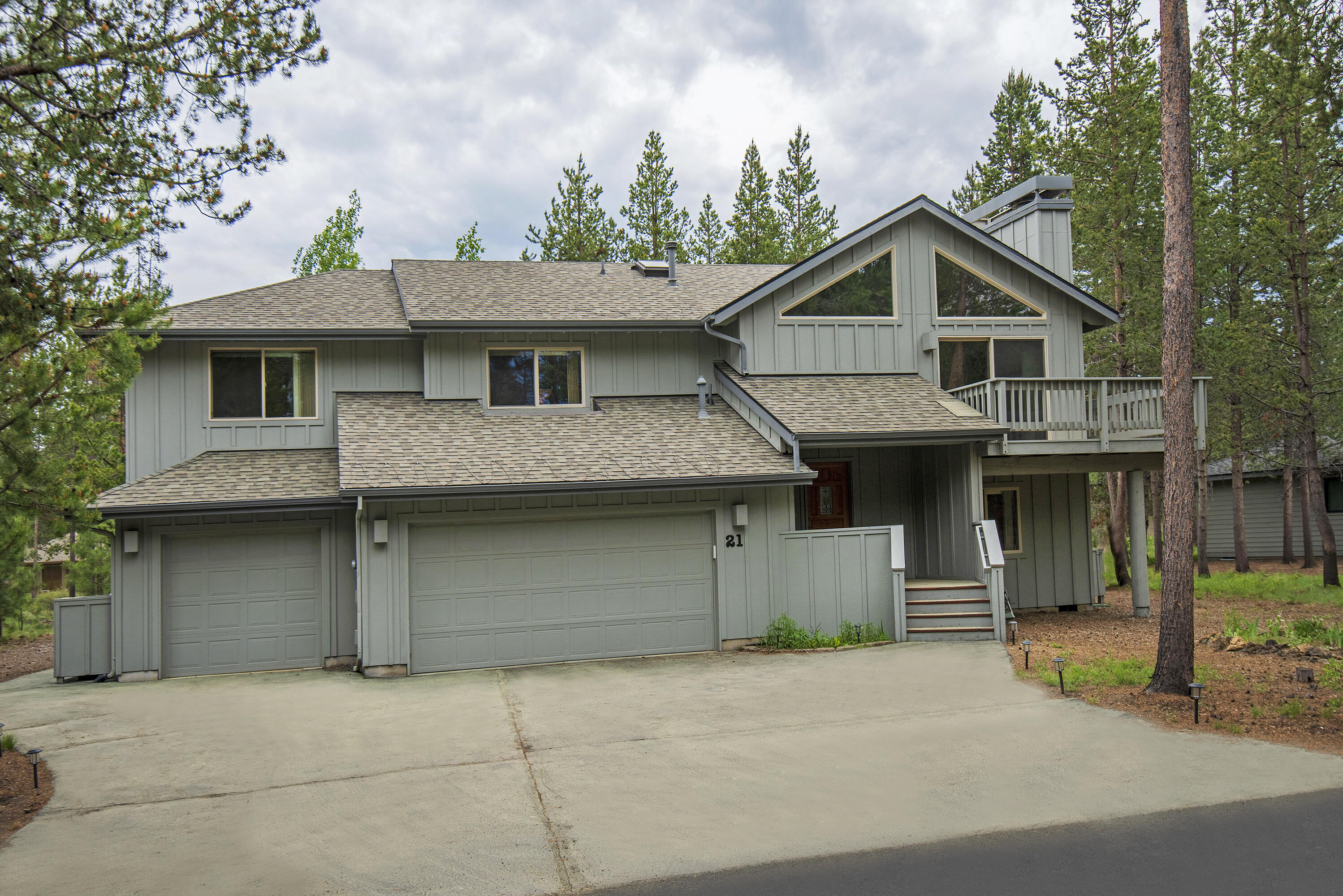 21 Dutchman Lane is located in the heart of Sunriver just off Cottonwood Rd., near the North store & Ft Rock Park.  The reverse living floorplan offers both a front and back deck off the great room.  Upstairs you will find a large open floorplan with great room, eating area and updated kitchen.  There is a powder bath, an office/4th sleeping area and a very large primary suite with walk in closet. Downstairs are two bedrooms; including a 2nd primary. There is an additional full bath and laundry room which leads to the garage.  The house has plenty of storage, but the garages really give you the space you need, for all your toys.  In addition to the two-car garage there is a 3rd bay, which is tandem and great for snowmobiles, a small boat, etc.  There is also a designated heated workshop and a large storage shed.  The large back deck, with awning, is plumbed for gas grill, wired for a hot tub and has stairs down to the back yard.