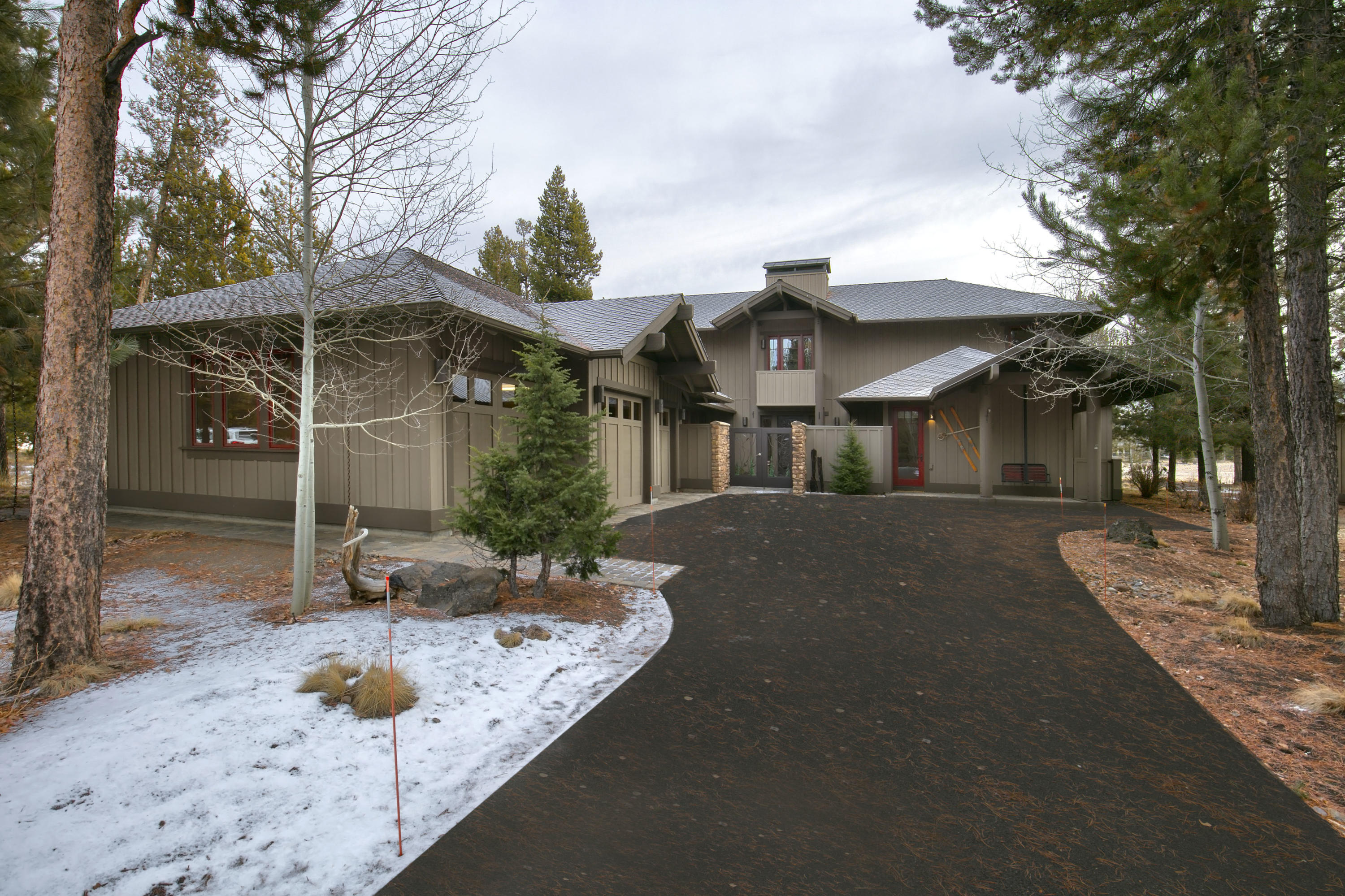 Live in luxury in a private, peaceful setting on the golf course in Caldera Springs! New owners will be delighted by the quality appointments found throughout the home that include slab granite surfaces, rustic exposed wood beams, extensive custom masonry, custom woodwork, cabinetry and lighting. The great room features a grand stone fireplace and two story wood wrapped Pella windows that showcase the backyard and golf course views. The large open kitchen would delight any discerning chef and a 'pub room' off the great room offers a wonderful additional space for entertaining (could be converted to guest bedroom). A courtyard front entry displays beautiful custom metal gates and a hand carved solid wood door. The back yard has an outdoor kitchen, lawn area and fire pit. A well executed floor plan offers a main level master suite, with the two additional bedroom suites, office and entertainment area on the upper level- perfect for either a primary residence or as a second home.