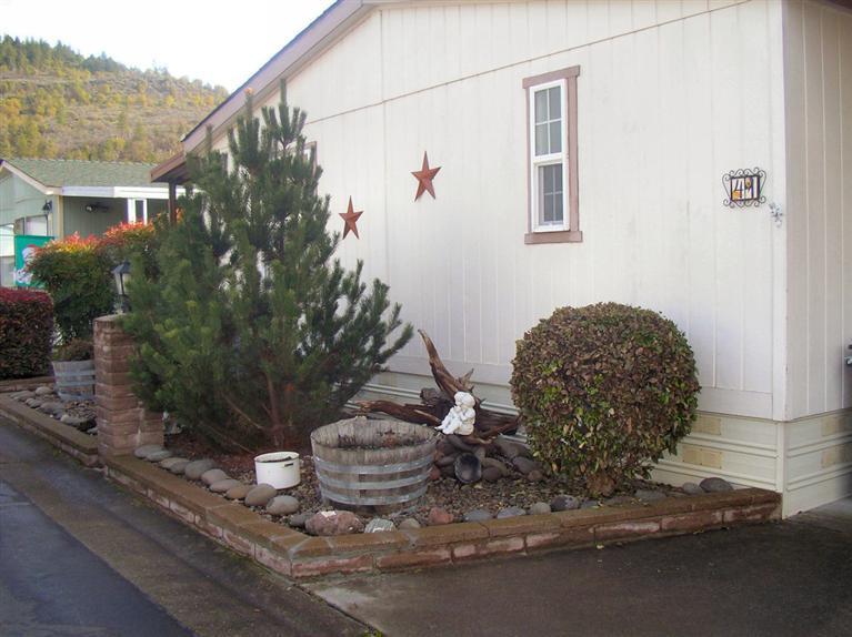 IT'S SOOOO CUTE! 3-Bedrooms, 2-bathrooms, vaulted ceiling, lovely front porch with mature shrubs for privacy. The backyard is nice size and plenty of room for garden area. Show & sell!