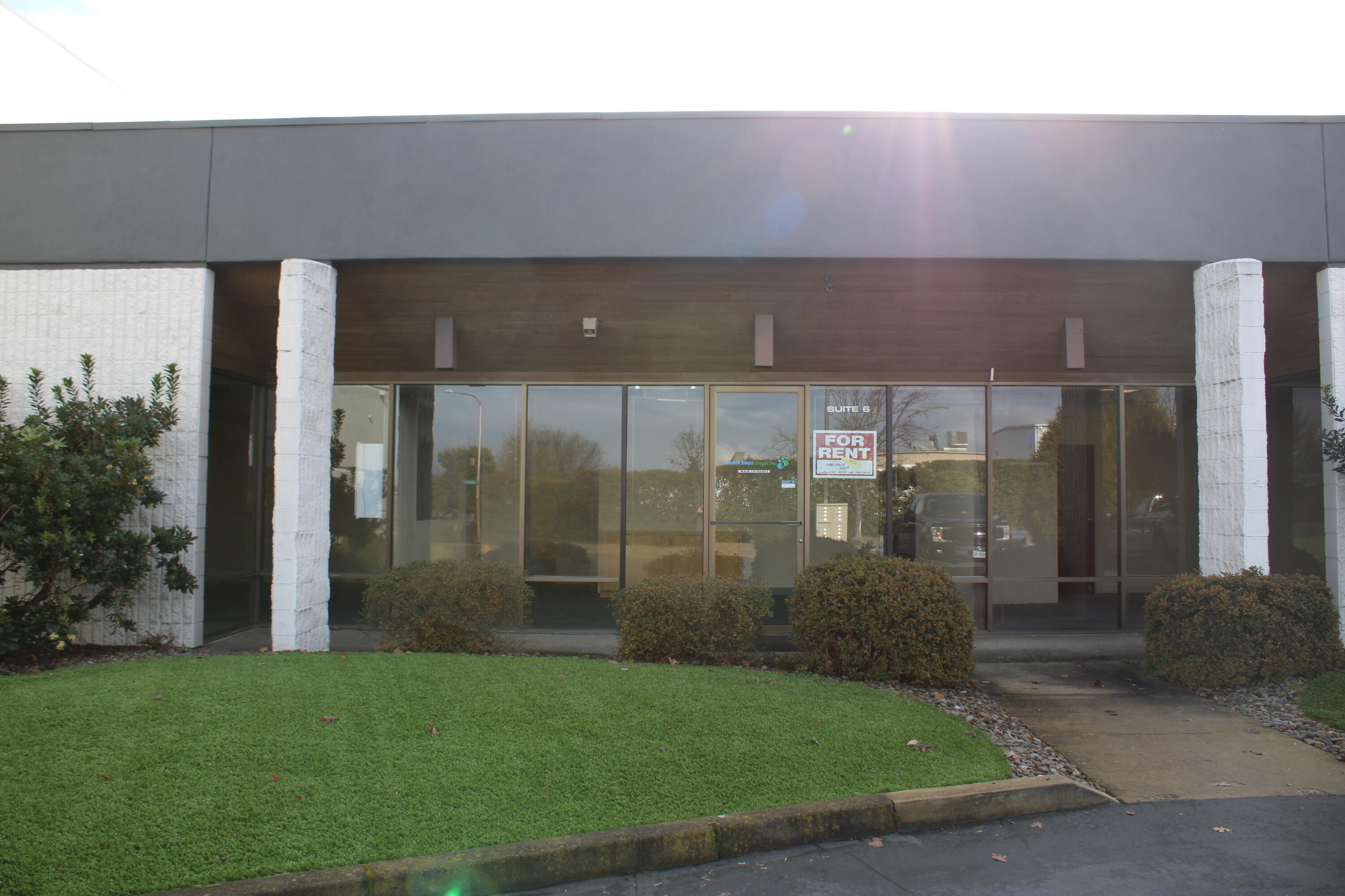 Welcome to an ideal business space with a versatile layout that provides endless possibilities. This 3818 square foot light industrial property is perfect for businesses looking for a dynamic workspace. The property includes five spacious offices, a breakroom/kitchenette, two bathrooms and two large multi-use rooms with built-in storage, countertop space, sinks and roll up doors. There are 8 dedicated parking spots and plenty of street parking as well. There is a security system infrastructure for the use and operation of the tenant. The owner covers water, sewer, property taxes and landscaping.