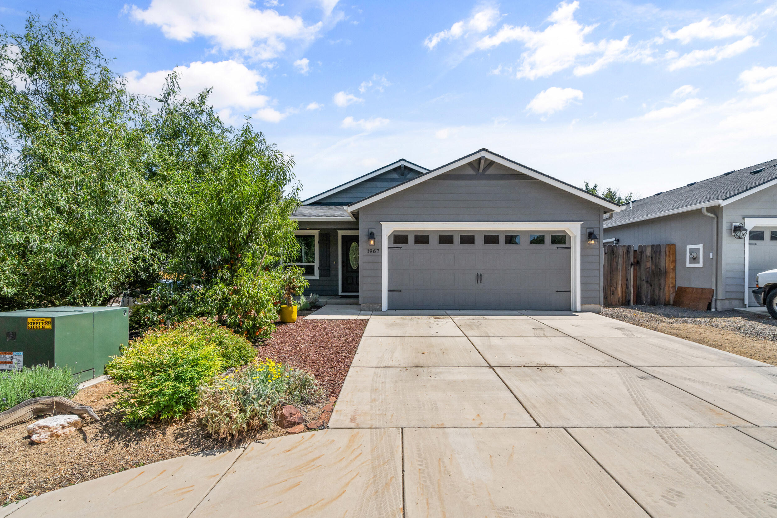 A huge plus!  Utility Costs are minimal due to the OWNED SOLAR PANEL SYSTEM with transferable warranty! BUILT IN 2020, this immaculate home is nestled in a quiet neighborhood. Featuring 3 bed/2 bath, & a spacious living area, this home offers the perfect blend of functionality & character. Arched doorways & vaulted ceilings lend timeless charm you won't find in most modern-built homes in its class. The kitchen is filled with natural light & boasts ample cabinetry, a breakfast bar, stainless steel appliances, & a seamless flow into the dining area.  The bedrooms are comfortable; the spacious primary en suite adds to the appeal. Outside is a fully fenced backyard & covered patio, with the potential to make your own backyard oasis. The attached 2-car garage & wide driveway provide plenty of room for parking. Don't miss out on this Like New Home, located close to parks, schools, shopping, & medical facilities!