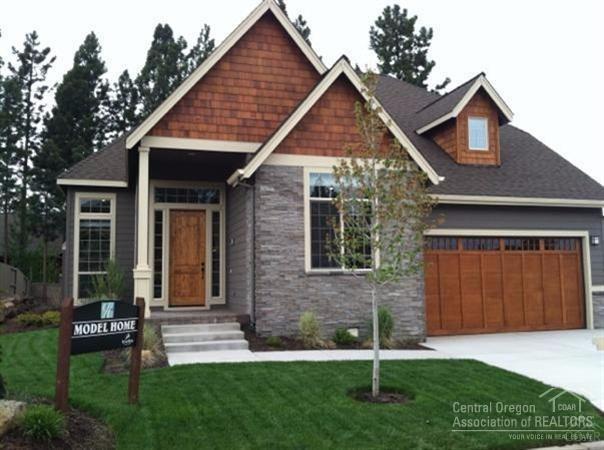 Beautiful award winning custom former model home in River Rim. Amazing value and attention to detail with upgraded appointments through-out. Fantastic floor plan - unique in River Rim...Main living, office, master bedroom downstairs. Expansive gourmet kitchen with large island for 5, overlooking great room w/floor to ceiling windows providing warmth and light. Must see custom finishes featuring designer upgrades galore...Don't miss this opportunity!