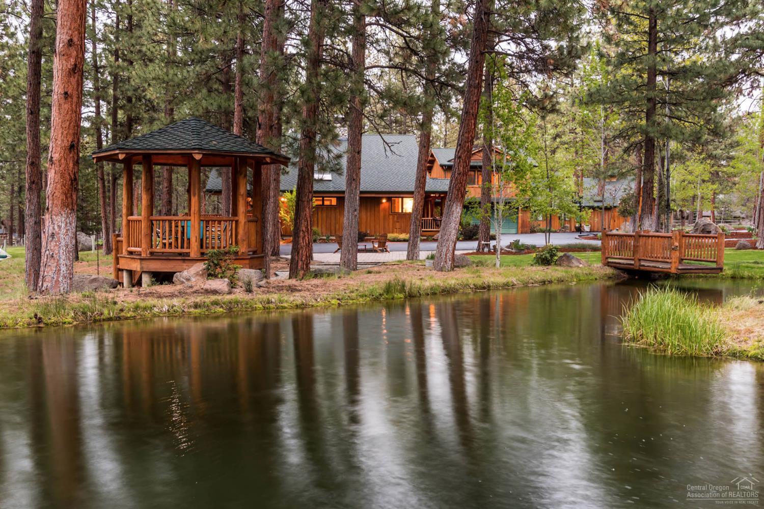 This GRAND home on 4+ acres of stunning Central Oregon beauty, is located close to Sisters in one of its star communities. The log framed home encompasses over 4200 feet of exceptional quality with many custom details. The river rock fireplace has to be seen to be believed. Zonal, radiant floor heating(even in the attached garage) keeps the winter nights at bay. Nearly 3000sq/ft of barn/shop/flex space allows for any dreamer to follow their heart. Horses or quilts: all can be accommodated.