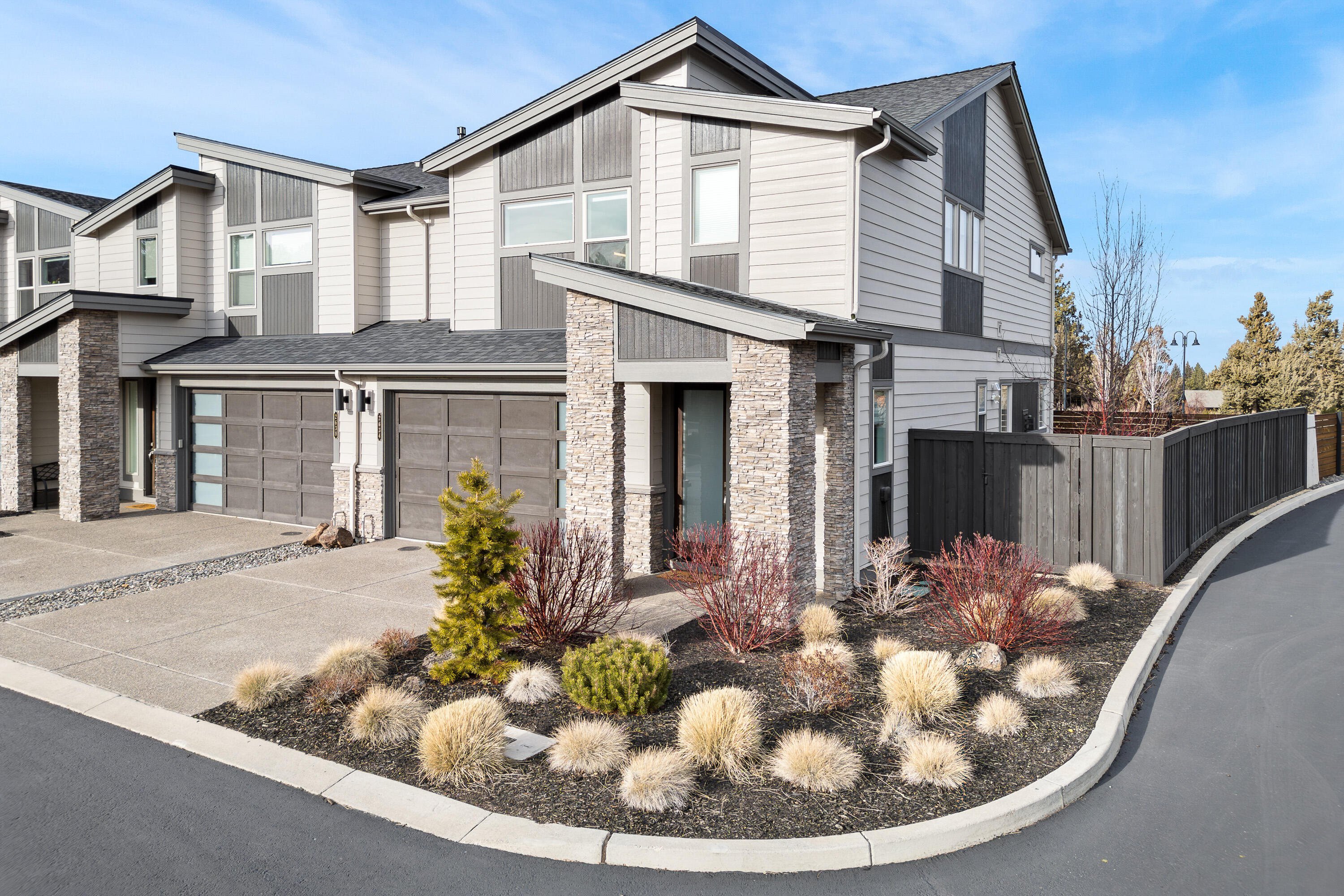 Enjoy outdoor adventures right at your doorstep with this charming Pahlisch-built townhouse in the
highly sought-after gated community ''The Pointe''. This beautiful home offers a perfect blend of
comfort and convenience, with an ideal location near the Deschutes River, River Trail, and downtown
Bend. The great room is flooded with light thanks to a stunning wall of windows and features built-in
cabinets with a cozy gas fireplace, creating a perfect spot for relaxing or entertaining. The kitchen
offers a huge island, quartz countertops and storage galore! Upstairs is well-appointed with two guest
rooms that features a Jack n Jill bath. The upstairs primary is a true retreat with a walk-in closet
and soaking tub, perfect for unwinding after a long day. The open loft area is ideal for a home
office. Step outside to enjoy the built-in fireplace & paver deck, perfect for cozy evenings outdoors.