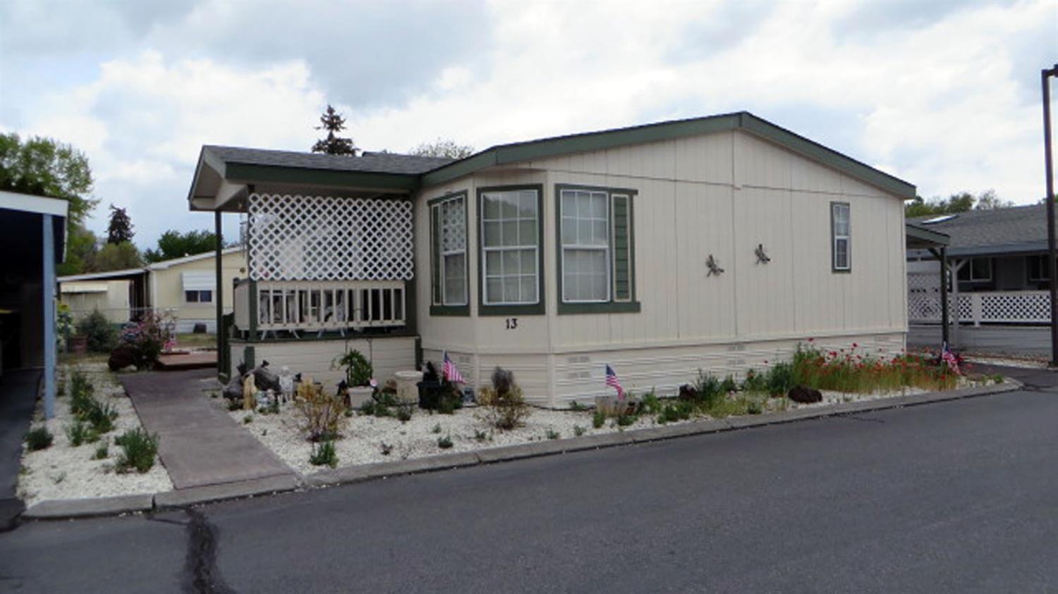 Come take a look at this well maintained home in Alpine Meadows Mobile Home Estates. The home features a split bedroom floor plan and has 3 bedrooms and 2 baths with 1,323 sq ft. It has a large master bedroom with walk-in closet and the on-suite bath with relaxing oversized tub. The roof was replaced 6 years ago (25 year composition roof). Monthly space rent is $369 which includes water, sewer, garbage, and snow removal. The Park has a nice Club House for events, and ask about RV and overflow parking availability. See Park Manager in #1 for required tenancy approval prior to submitting an offer.