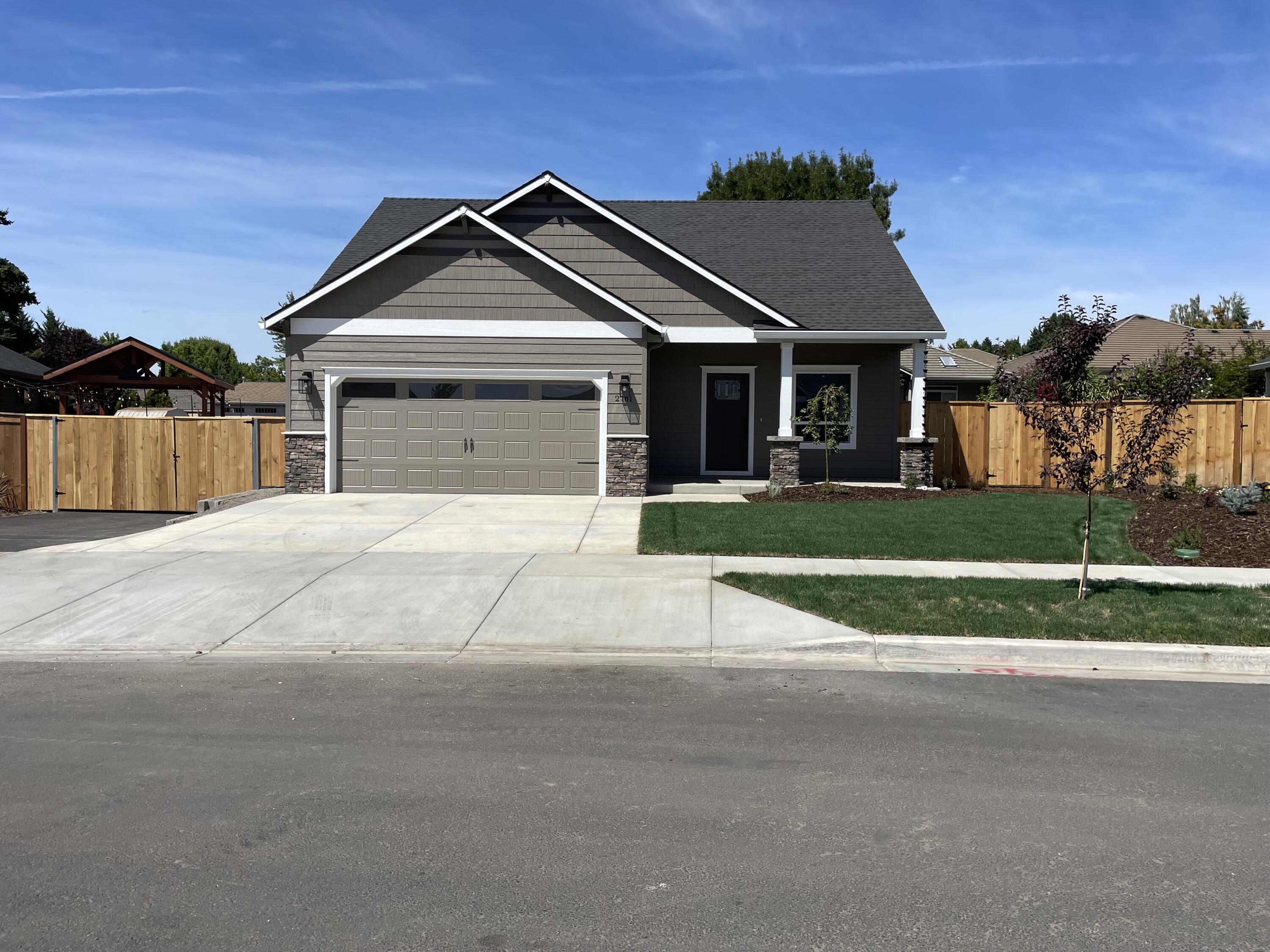 New Home Built by Horton Homes Inc. in a convenient East Medford neighborhood.  Our popular floor plan has an open concept for real living, 3 bedroom, 2.5 bathrooms, finished 2 car garage, and 
RV parking.  This home comes with Gas stove and furnance, granite counter tops, premium water proof laminate flooring, stainless steel appliances. Master bedroom is on main floor. 9 foot ceilings, Fence, and Landscaped, Gas stub out on back porch. One Year Builders Warranty included. Taxes are not based yet.  Listing agent is related to seller and builder.