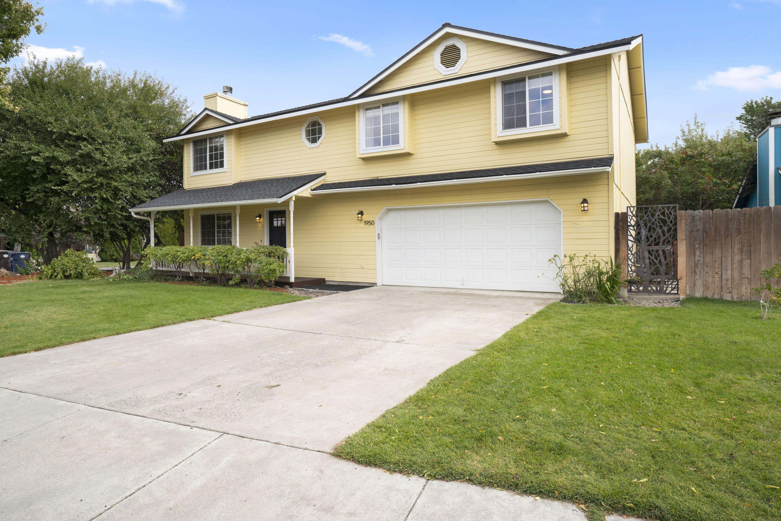 Room for everyone in this lovely 4-bedroom, 2.5-bath home situated on a beautifully landscaped .14-acre lot with mature trees. Relax on the cozy front covered porch or retreat to your private backyard sanctuary—perfect for entertaining, gardening, or simply enjoying Central Oregon's seasons. Plenty of room for your kids or pets to play.
 Brand new Furnace just installed.

A great He/She shed with its own mini-split heat pump provides the perfect spot for hobbies, a home office, or a quiet getaway. Inside, you'll find freshly painted interiors, a welcoming gas fireplace, and a spacious kitchen featuring stainless steel appliances and Corian countertops. An additional bedroom can easily serve as an office or guest room, offering flexible living options.

Located in a desirable Northwest neighborhood close to schools, shopping, and much more. All appliances are included—making this home truly move-in ready and waiting for you!