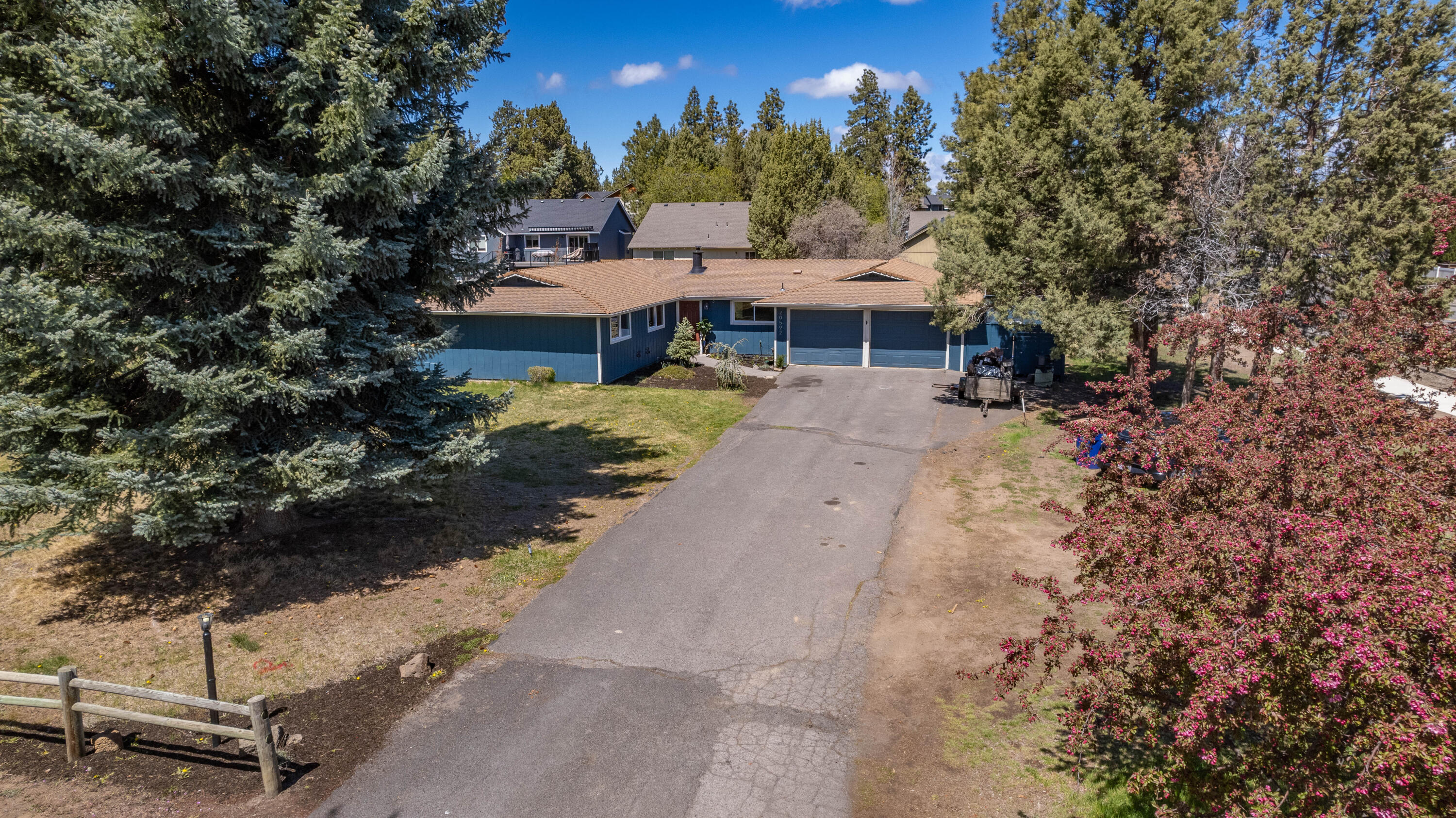 NEW 22K Price Drop! Time to act on this rare opportunity to own a 4-bedroom, single-level home nestled in SE Bend. Situated on a spacious corner lot, Tillicum Village is one of Bend's most established neighborhoods, providing a serene, park-like setting for the homeowners. This 1868 SF home has undergone a host of updates: new interior paint, lighting, plush carpeting in the bedrooms and renovated bathrooms. With newer laminate flooring, exterior paint, and kitchen enhancements, the home exudes contemporary charm. The expansive great room is anchored by a cozy wood-burning stove for added warmth and atmosphere. A versatile flex space is accessed by French doors. Step outside to the covered and enclosed patio area, complete with a freshly painted deck, fence and a hot tub. The big grassy area surrounding the property provides ample room for fun. All this plus lots of room to park your toys. Don't miss your chance to live in Bend just in time for the popular summer months.