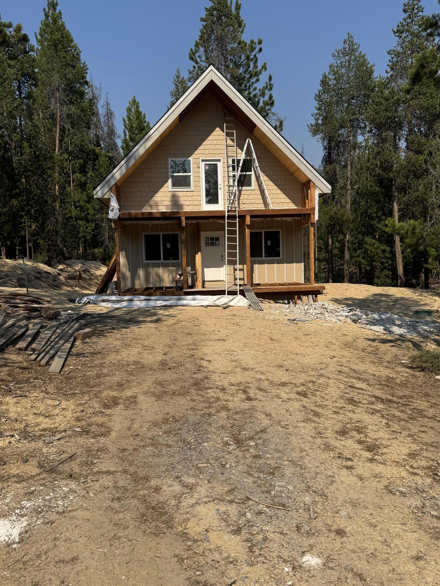 Unfinished Custom built cabin, located in Diamond Peaks. Main floor, features open floor plan, kitchen, dining with 1 bedroom, laundry room, bathroom & covered deck. The kitchen has stainless steel appliances and butcher block counter tops. Three additional bedrooms & bathroom upstairs with deck off Master bedroom. This home would make a beautiful full time residence or vacation rental. All of this on 1 acre with lots of room for parking.  Streets are paved and maintained year round.  Community water. Easy access to forestlands.  Located just minutes from Willamette Pass Ski Resort, Pacific Crest Trail, Odell and Crescent Lakes & numerous other mountain lakes. Enjoy outdoor activities the area has to offer, skiing, hiking, snowmobiling, fishing, boating.