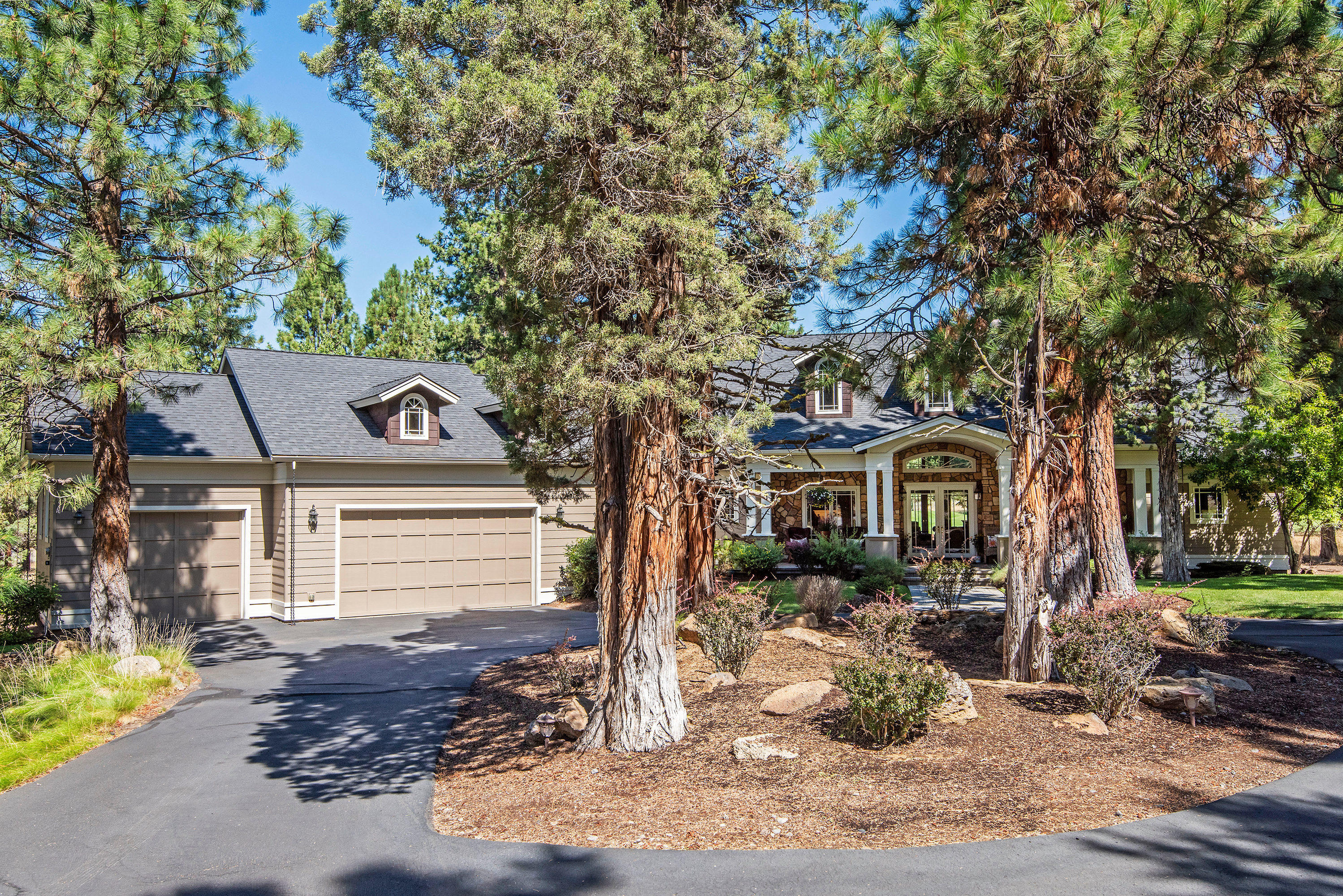 An Acre of landscaped, manicured land on a large corner lot overlooking the 18th Hole in beautiful Aspen Lakes Golf Course. Completely remodeled - this 4,250 sq.ft. home is stunning. Large Master with fireplace on the Main level. Gourmet Kitchen with Stainless Steel Appliances. Quaint and cozy Den fireplace. Office on the Main level. 2 additional bedrooms with ensuite bathrooms also on the Main Level. Big Bonus/Media/Game Room with full bathroom upstairs. Big, expansive windows look out onto the golf course and make this house light and bright. Private, Quiet and serene. Just a short drive to the beautiful town of Sisters, Oregon. Escape to Aspen Lakes, escape to Sisters, Oregon - this home has everything you need.