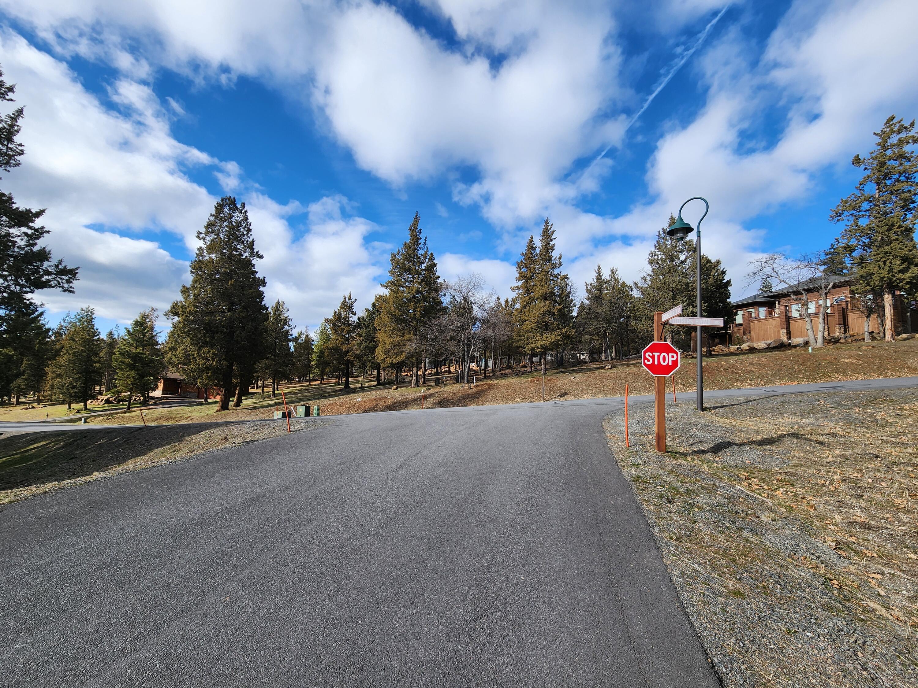 NEW PRICE.Create your dream home on this 0.48-acre lot with a golf course view on Coopers Hawk Road located in Running Y Ranch Resort. This lot's lightly wooded w/minimal rocks & gentle slope, ideal for excavation. With no time-constraints on building, start taking advantage of amazing resort amenities while designing the perfect home! Enjoy amenities like fitness center w/indoor pool&spa, dog park & on-site dining options such as Ruddy Duck Restauran & general store/deli plus breathtaking views & abundant wildlife on miles of scenic walking/biking trails. HOA dues also include 24/7 security & on-site support during reg. business hrs, ensuring peace of mind. Golfers will love the Arnold Palmer-designed golf course in the center of the resort. Don't miss the opportunity to invest in one of Southern Oregon's most sought-after resort communities. Whether you plan to build now or later, this lot offers a perfect blend of natural beauty & luxury living. Neighboring .48 acre lot also availa