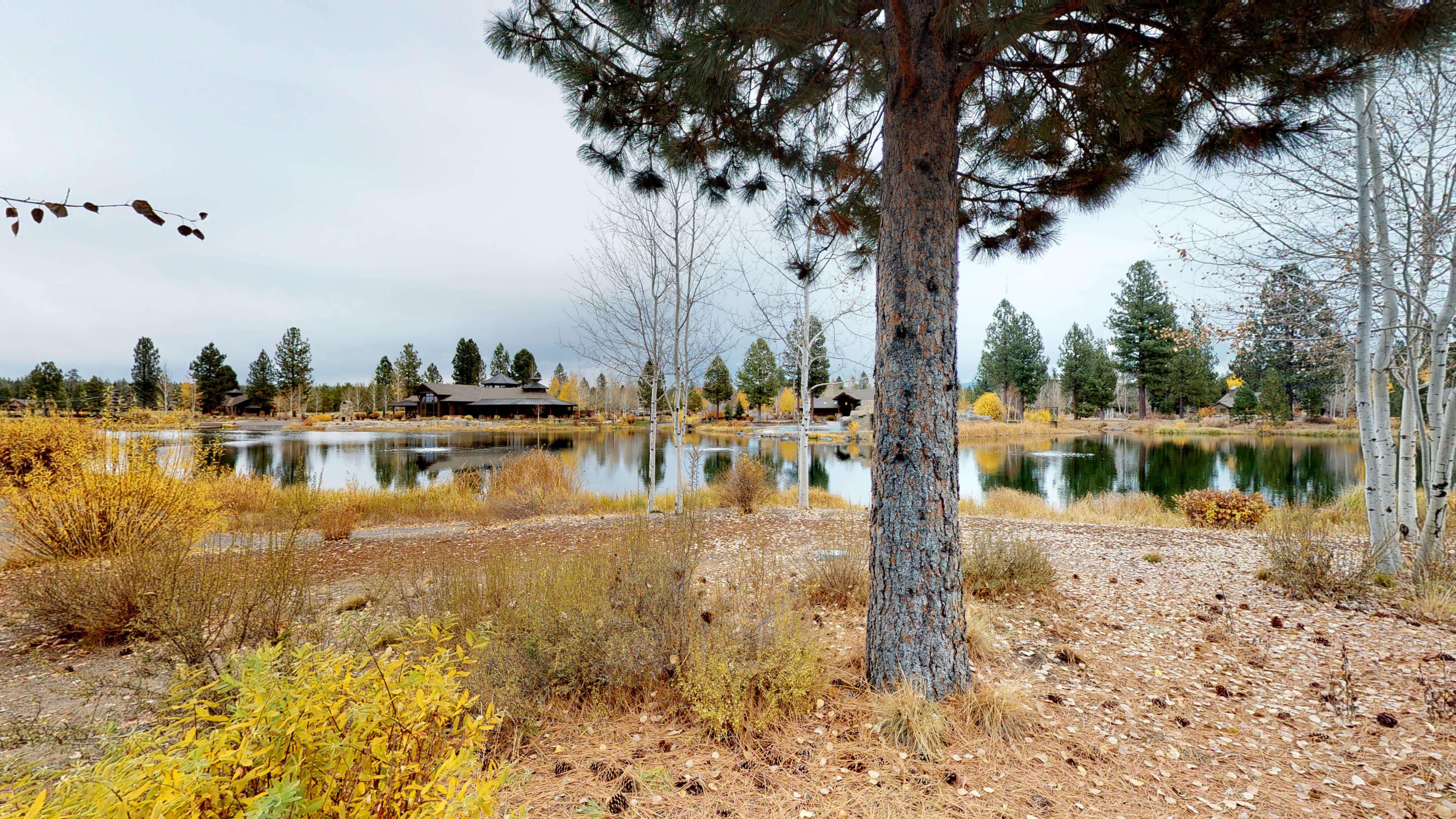 A  PRIME LOCATION, LAKE FRONT CABIN ! Experience the best of Caldera Springs Cabin 16 located on the lake directly across from the Lake House. Relax and enjoy the peacefulness and beauty overlooking the lake from your back patio.  Beautifully decorated 2691 sq. ft. of spacious living space. High end features throughout, including a gourmet kitchen with slab granite counters, knotty alder cabinets, a gas cook top with a custom copper hood, Vaulted ceilings in the great room, a floor to ceiling stone fireplace and built ins, 3 master suites on the main level, plus a den with a barn door. Upstairs is an additional bonus room and bunk room, spacious garage, a extended patio has an outdoor hot tub and fire pit. Sold furnished per inventory. Caldera Cabin 16 has a great rental history. Just few steps out the back door for fishing or a walk to the Lake House. The 38 week deed-restricted property (needs to be available 38 weeks a year and managed by a licensed property management co.)
