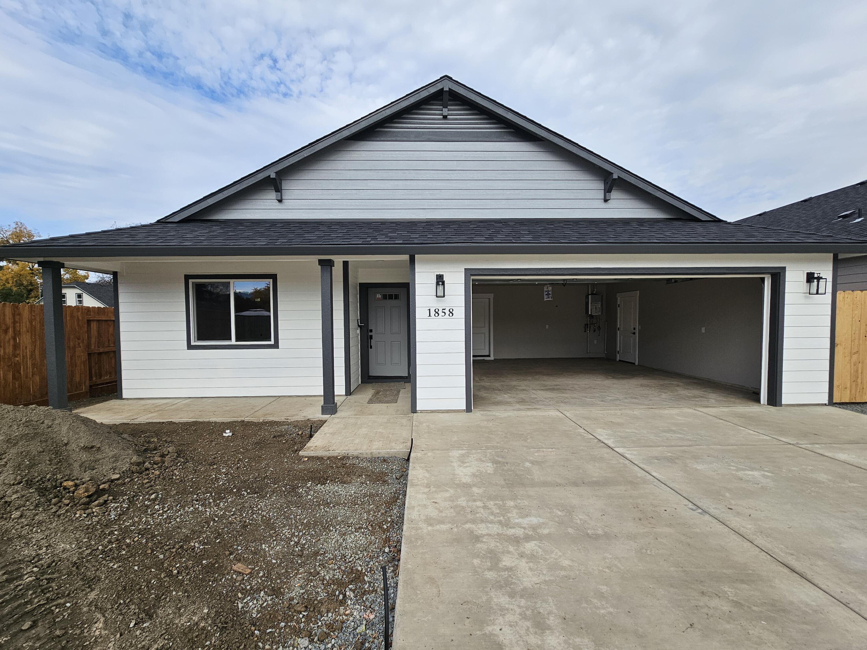This beautiful NEW CONSTRUCTION home is located in a wonderful neighborhood in Southwest Medford! Ready for it's first owner! Featuring 3 bedrooms and 2 full baths. The open floor plan is light and has tall vaulted ceilings. Master bedroom features a walk in closet. The home is very energy efficient! With a low maintenance backyard, this home is perfect for a first time buyer or small family or investor looking to fill their portfolio! Hard to find and quality construction built by Janakes Builders LLC! Don't wait to come and tour this home set to be completed shortly!