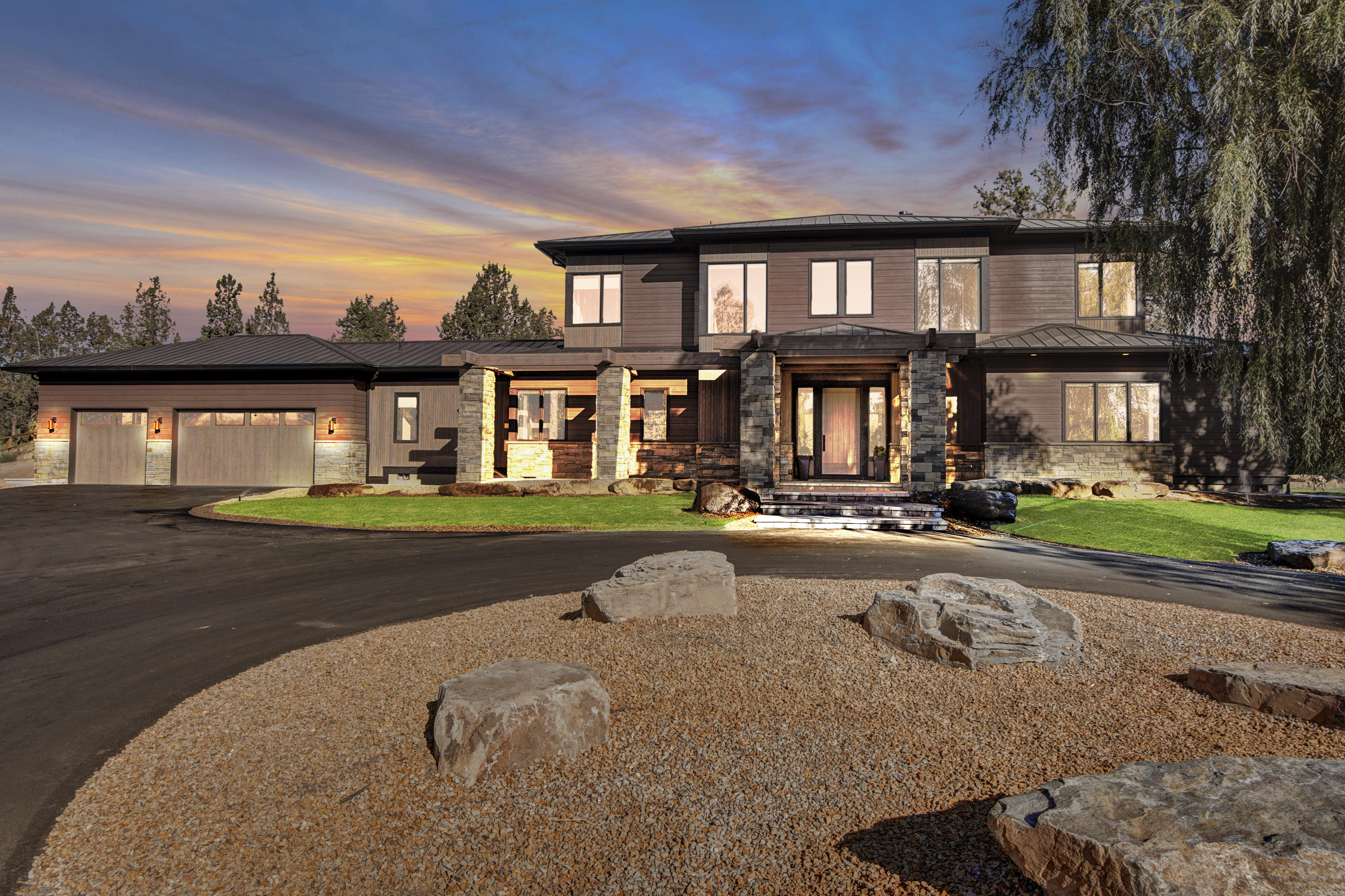 Amazing Riverfront Estate located on the Deschutes River in Tumalo just outside of Bend, OR.  Built in 2016, the 3364 sq. ft. main home sits just off the river creating an amazingly peaceful and serene setting for this 5.67 acre, tree lined property.  Two fully finished RV garages located to the east of the main home round out this spectacular estate.  3 beds, 3.5 baths with master on the main + office in main home. Beautifully finished living area, kitchen and bathroom in the 686 sq. ft. guest quarters attached to the 1st of 2 fully finished RV garages. 
Winner of Best Master Suite and Best Feature for its double iron staircases in the COBA Tour of Homes, no detail was missed in the construction of this home. Float the river, fish out your back yard, enjoy 3.2 acres of irrigation for the beautiful field and so much more.  A home built for your dreams and able to house all your toys.