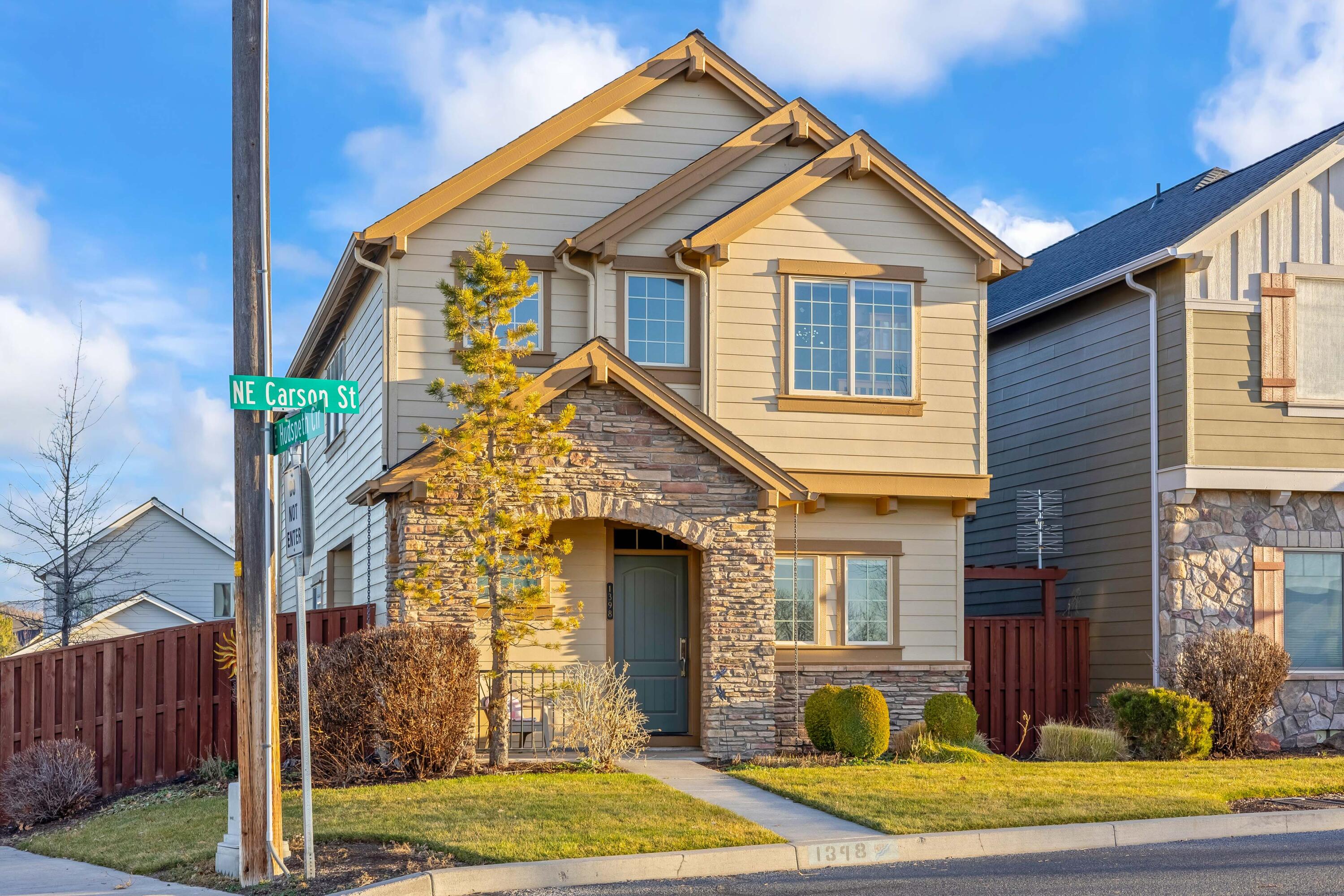 Gaze upon Barnes Butte from this corner lot home! There is an easy maintenance side yard and the HOA maintains the front yard. Green space is just across the quiet street. This home features an entry area, gas fireplace, pantry in the kitchen, and has an upstairs bonus area with an office nook. The primary bedroom includes a window seat, walk in closet, and has double sinks and a skylight in the bathroom. The laundry room is conveniently located upstairs as well. Two guest rooms and a full bathroom, also with double sinks, complete the upstairs. A utility sink in the garage makes cleanup easy! Community features include a playground, walking paths, pool, and basketball court. 30 minutes to the regional airport in Redmond and 50 minutes to Bend.