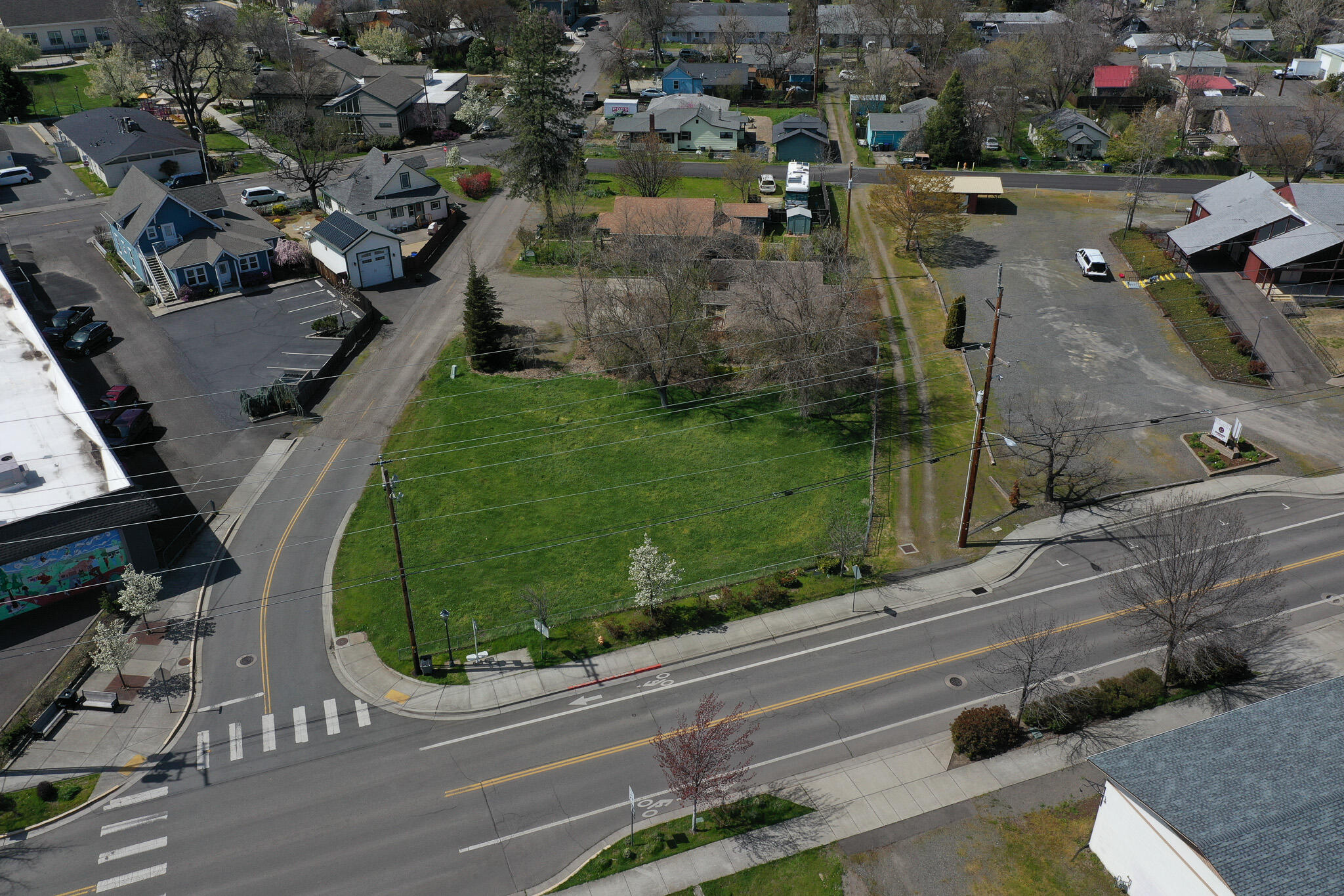 Two lots located in the downtown Talent area. They are zoned Central Business District which allows for mixed use. Located on the bus line, walking distance to shops and schools. Water lines and sewer stubs are located to each lot. This could make a fantastic spot for small business footprints with residential units on the second floor. Bring you creativity to this fantastic community. The owner is a licensed real estate broker in the State of Oregon.  The addresses are 60 and 68 Talent Ave. The  listed price is for both tax lots and they must be sold together.