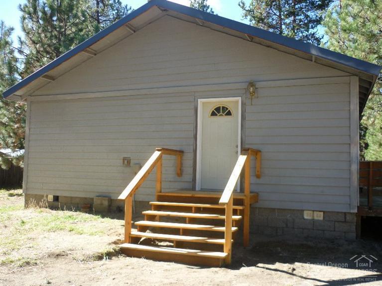 Nice property, fully fenced with circle driveway and gated. Home very well built and insulated. Upgraded windows and master bath. Large front deck. Well built carport 24x24 w/slab and metal roof and sides.
