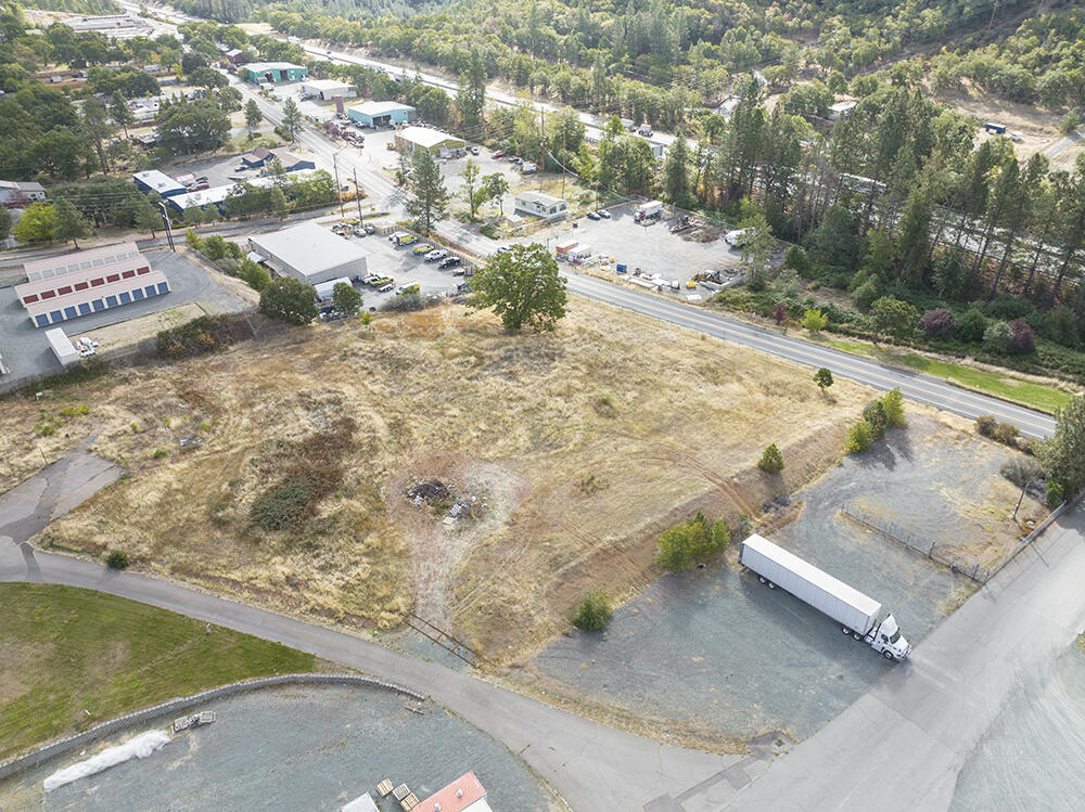 For Sale or Lease! 3.11 Acres of Prime Rural Commercial Property with Fantastic I-5 Exposure & Easy Access in the Town of Grants Pass, Oregon! This Desirable Property Offers a Power Drop and Meter, & Other Utilities. Rural Industrial Zoning allows for a multitude of Industrial/Commercial uses, & allows for Property Division into 1/2 Acre Parcels! Minutes to City Limits & I-5 Ramps, & enjoys a Low County Tax Rate. Ready to go for your Next Commercial Venture! Paved Access and Drive, and Excellent Signage. There is Amazing Opportunity here!