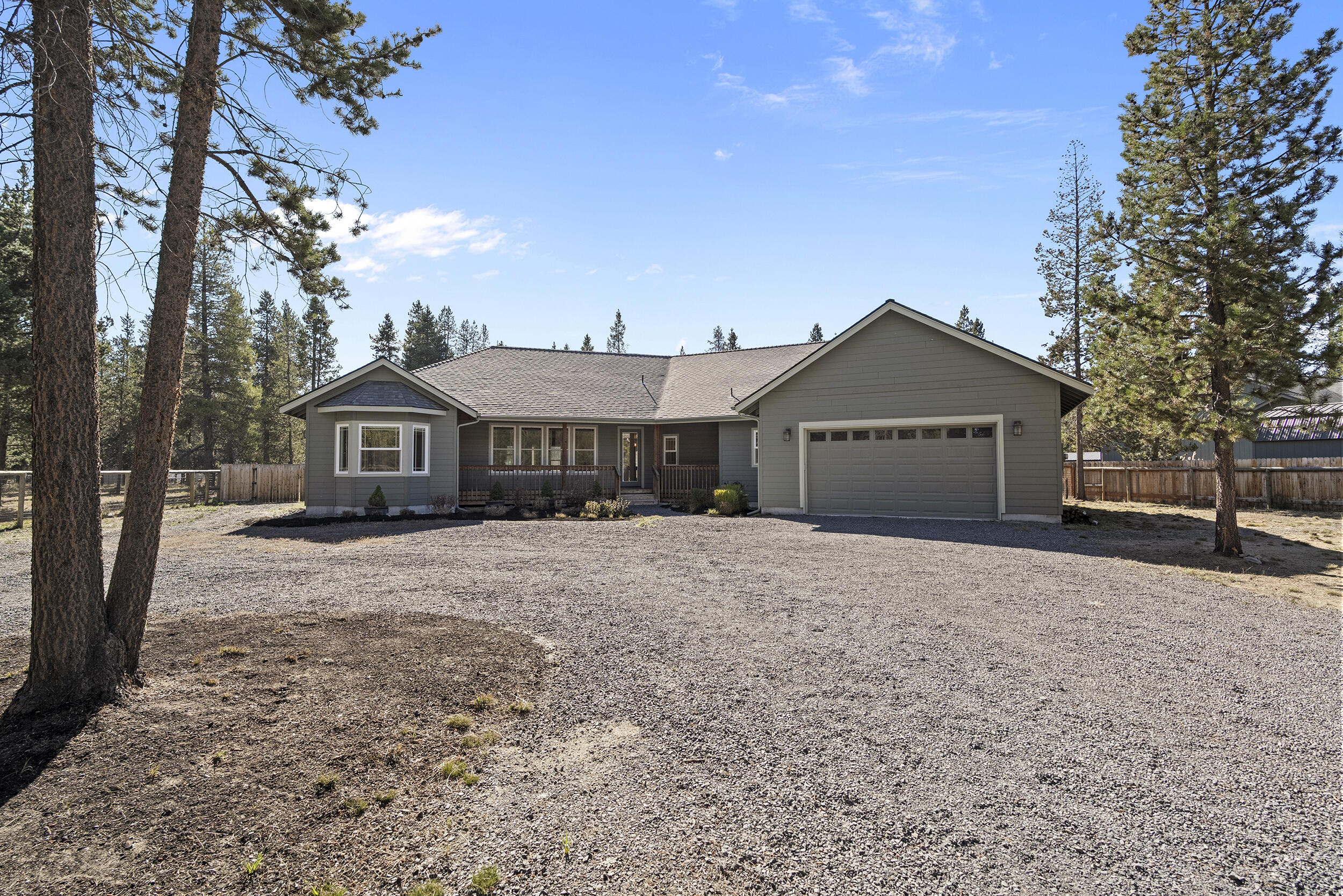 Buy This Home. Save Thousands! With a $20,000 seller credit for a rate buy down, you can reduce your payment and make homeownership more affordable today.Built in 2019, this beautifully maintained single-level home blends modern comfort with relaxed country living. An open, inviting floor plan welcomes you in with abundant natural light, granite countertops, a spacious kitchen island, and stainless steel appliances. The primary suite offers a private retreat featuring a walk-in closet, dedicated office space, and a spa-like en-suite with dual vanity, soaking tub, and tile shower. Two additional bedrooms share a convenient Jack-and-Jill bath, plus a half bath for guests. Enjoy thoughtful touches throughout including a laundry/mud room with sink and an extra-deep two-car garage. Extend your living outdoors with a sunroom and expansive covered back deck with ceiling fans—perfect for year-round enjoyment. Fully fenced yard, RV parking, and room to roam complete this move-in ready La Pine