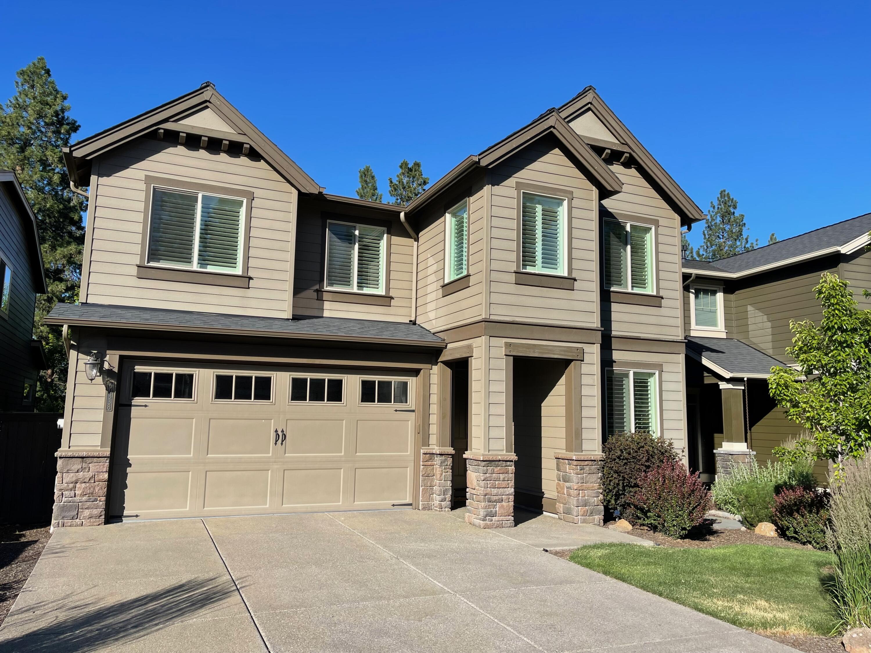 This home is an entertainers delight! The gorgeous kitchen has quartz countertops, SS appliances, abundant cabinets, large kitchen island, breakfast bar, that overlooks the 20X15 light filled great room that has high ceilings, gas FP, built in cabinets/shelves, and a wall of windows. There is also an office/den on the main floor. The spacious primary bedroom has coffered ceilings and a bathroom with double vanities, large soaking tub, tile shower & walk in closet. Three more bedrooms upstairs and a huge 17X12 5th bedroom/bonus room. Entertain in the backyard on the covered, Trex deck or patio area that backs to a landscaped, pathed open space that leads to the community pool just a short distance away.