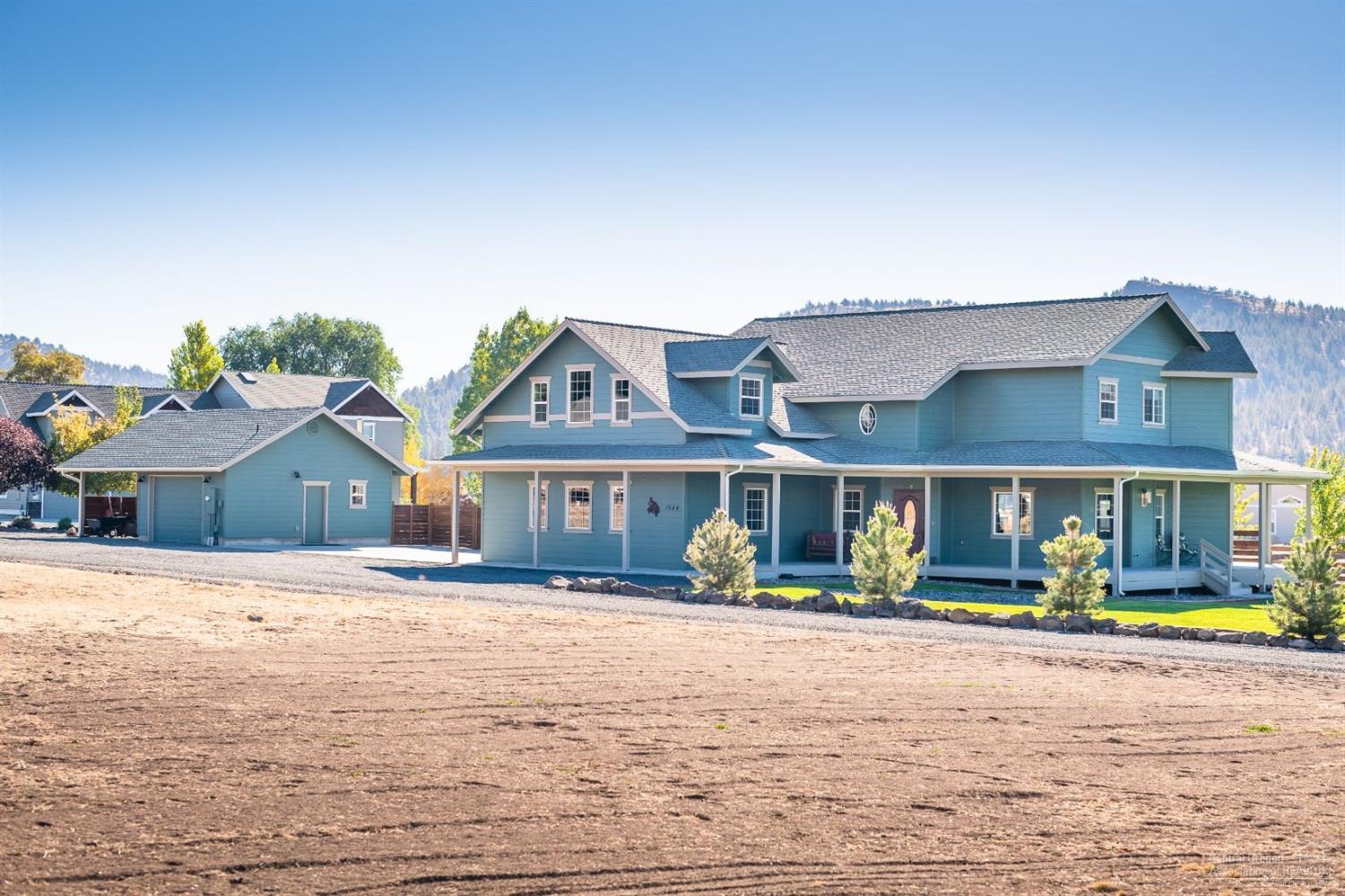Pride in ownership shows in every aspect of this beautiful custom home on one acre at Ochoco Reservoir with lake access and a wrap around covered deck. Home has all new interior paint and wood flooring throughout most of the home and updated light fixtures. New concrete pad between attached and detected garage that has a half bath and carport, plenty of room for all of your toys. property is manicured with all new fencing and a stamped concrete fire pit.