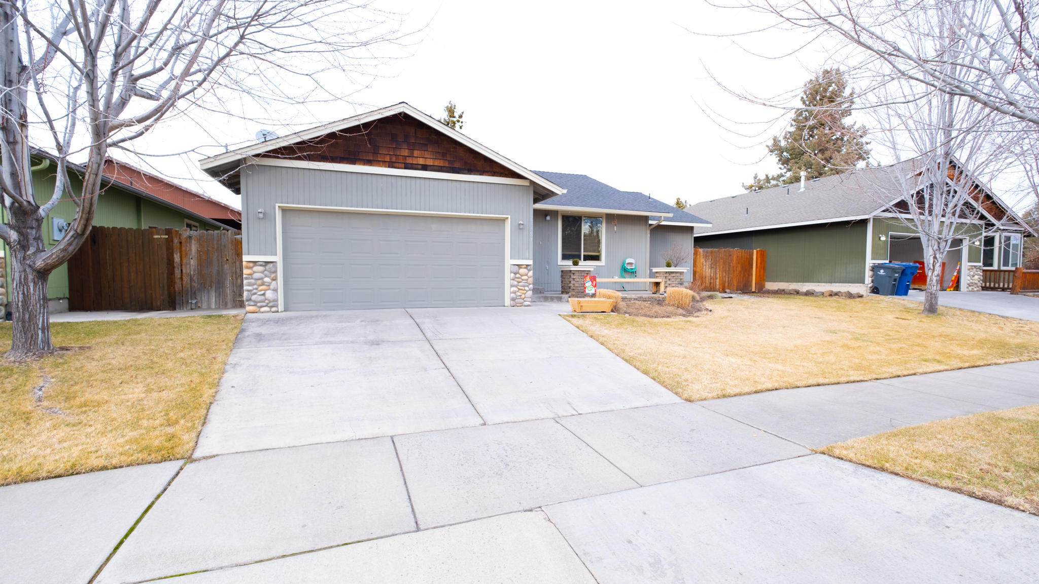 Vaulted ceilings and an open floor plan greet you as you walk into this updated and remodeled single level home.  The kitchen has been upgraded with granite counters, wine fridge, additional cabinets, an expansive island, and stainless steel appliances.  Home is trimmed out in pine and hemlock trim with a beautiful gas fireplace surrounded by river rock.  Home has new interior paint and new carpet and laminate flooring.  Home has nice separation between master and bedrooms.  Private patio and a perfect sized yard that is completely fenced.  Close to shopping, entertainment, schools and parks.  Ideal for an investor as there are tenants in place until March 31, 2022.  A wonderful place to call home!