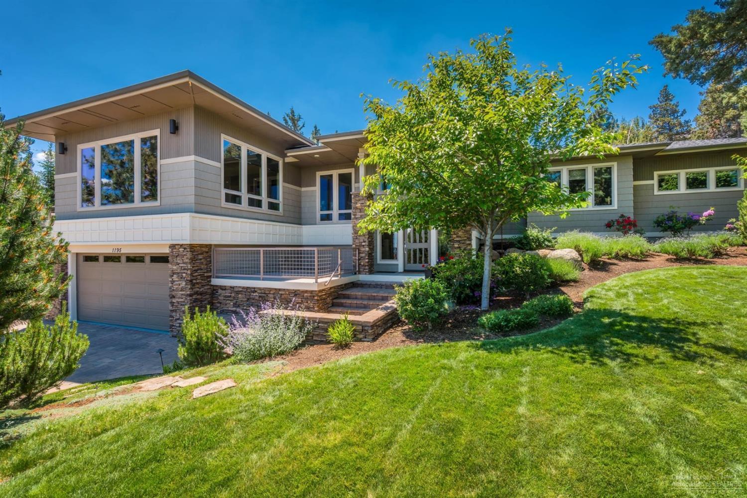 Grand contemporary home atop Awbrey Butte w/ sweeping views from Mt Hood to the Ochocos. Bright, open greatroom layout w/ designer picked interior, 3 suites, office & gourmet kitchen on main level. Exercise Rm, Wine Rm, 2nd Powder & Media Rm currently being used as an artist's studio below. Exquisite mature landscaping, water feature & rear patio w/ fire pit provide shade & an intimate & calming space, while the front deck provides sun & stunning views-both conveniently located off kitchen/dining areas.