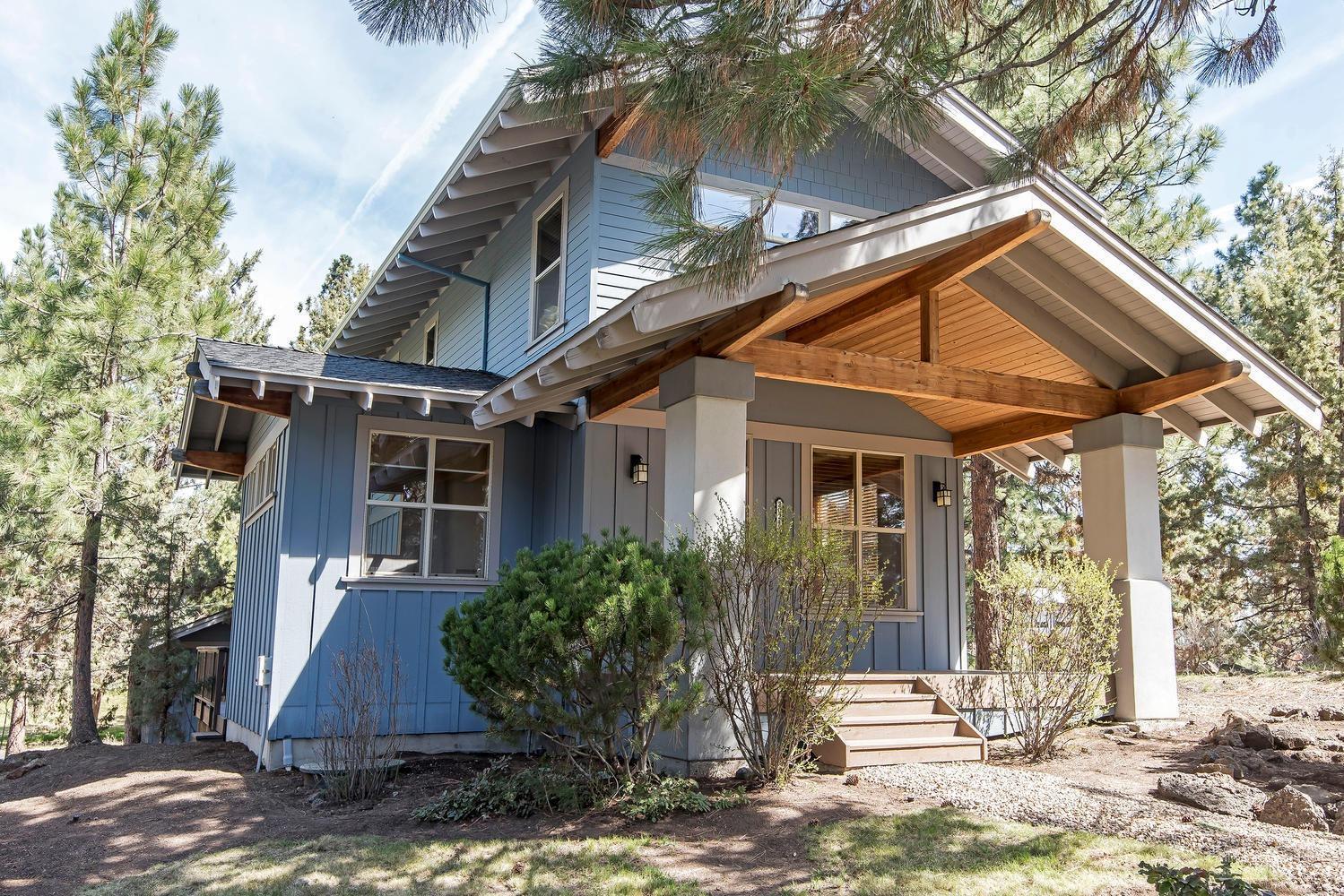 This adorable, well kept home features hardwood floors, a free standing gas fireplace, separate den/office on main level with stained concrete floor. Detached double garage with alley access. Nicely landscaped with ample outdoor entertaining options. Possible ADU options over detached garage? RV parking. Great location near schools, shopping and the river trail