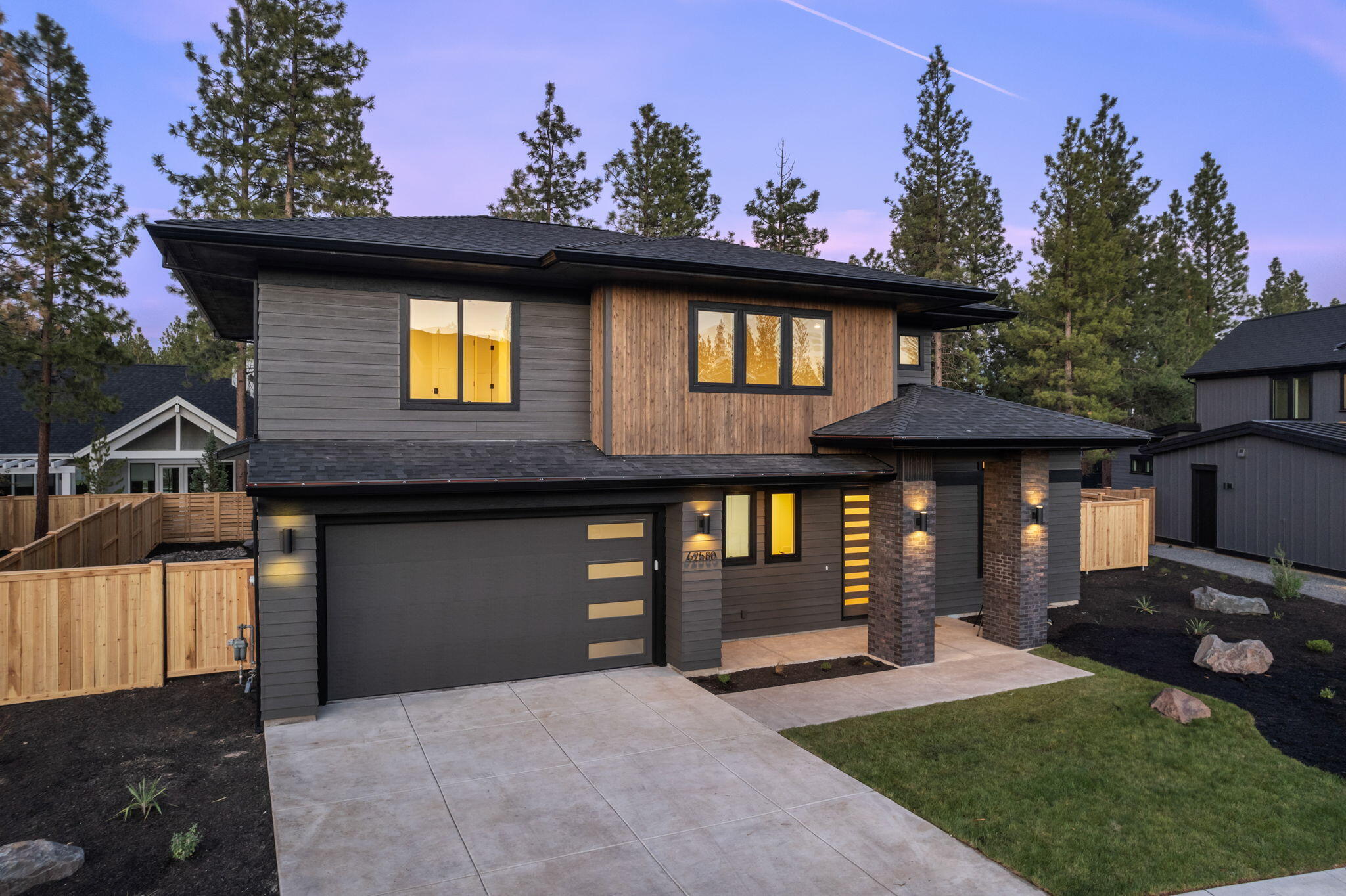 Introducing the newest builder in Shevlin West. Crafting unique and beautiful homes in Lane County for over 30 years, now bringing expertise to Central Oregon. Bruce Wiechert Custom Homes, Inc. homes are a testament to imagination, quality, and exceptional service. This 4-Bedroom, 2.5 bathroom Northwest Contemporary Design graces a stunning location in the coveted new neighborhood. Step inside to embrace the open-concept layout, soaked in natural light, showcasing the gourmet kitchen with quartz counters, Rift Oak Cabinetry, and Thermador appliances. The main floor hosts the primary suite and a versatile den or dedicated home office, while upstairs, three additional bedrooms, a full bath, and a spacious bonus room offer Cascade Mountain views. Outside, enjoy the vast landscaped and fully fenced backyard. Enjoy the epitome of Northwest living in this exquisite Shevlin West residence, where the beauty of the location is enhanced by the future new park being competed soon.