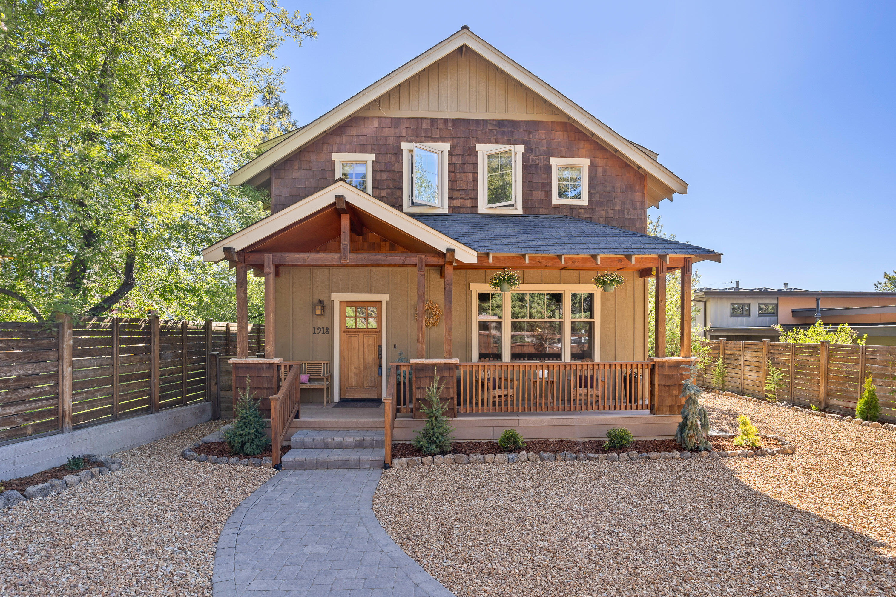 Beautiful craftsman home in the Bend View neighborhood close to downtown. The home features 2644 square feet of living space consisting of beautiful hardwood floors in the living room and dining area. There is a half bath off of the kitchen and an office off of the dining room. The upstairs contains the primary bedroom along with two additional bedrooms, the laundry room and two bathrooms. In addition there is a detached ADU with one bedroom, one bathroom, living area and kitchenette above the garage. The outside has a beautiful low maintenance yard with a built in firepit and fencing around the perimeter of the property.